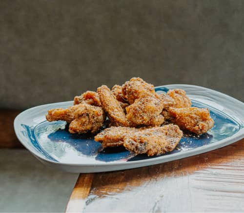 Ailes de poulet panées assaisonnées