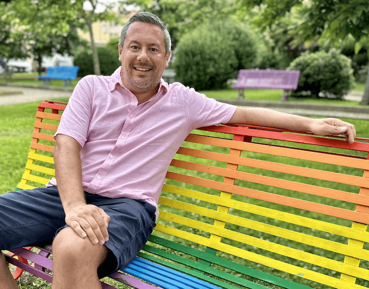 Brand strategist London set on a rainbow bench