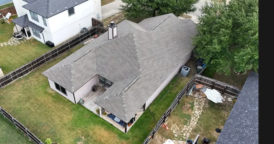 Completed roof: GAF Natural Shadow Weathered Wood roofing project in New Braunfels, 2026, view 16; roof overview used to introduce the installation topic.