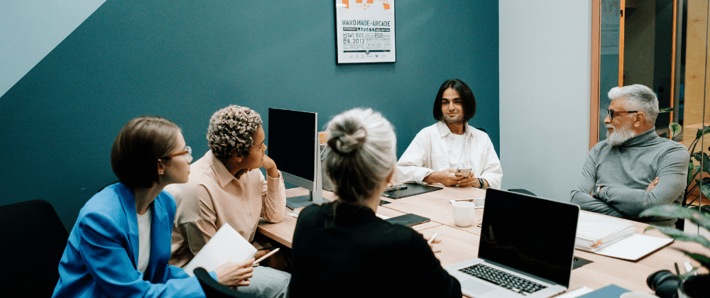 Team stareing at a junior teammate