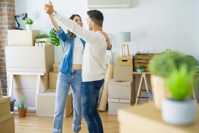 Young couple moving into new house