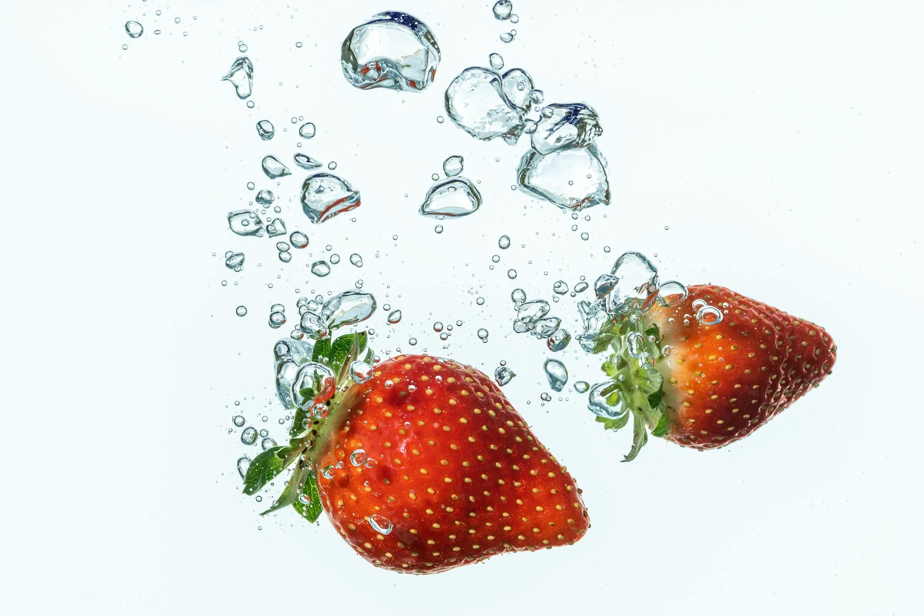 Students in a classroom setting looking at a colorful poster about nutrition and the human circulatory system.
