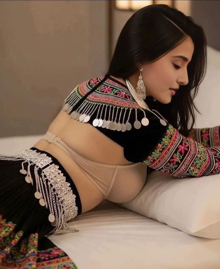 kids lying on a glass land and smiling