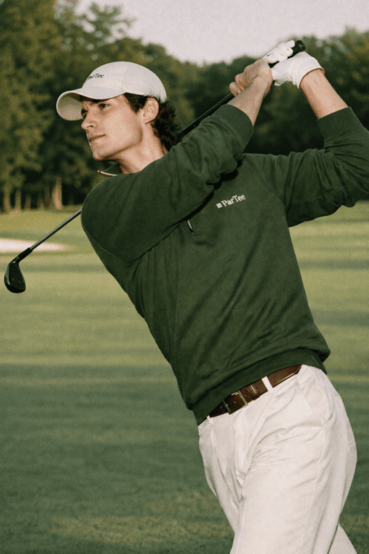 Young girl with a hat smiling in the sunny weather