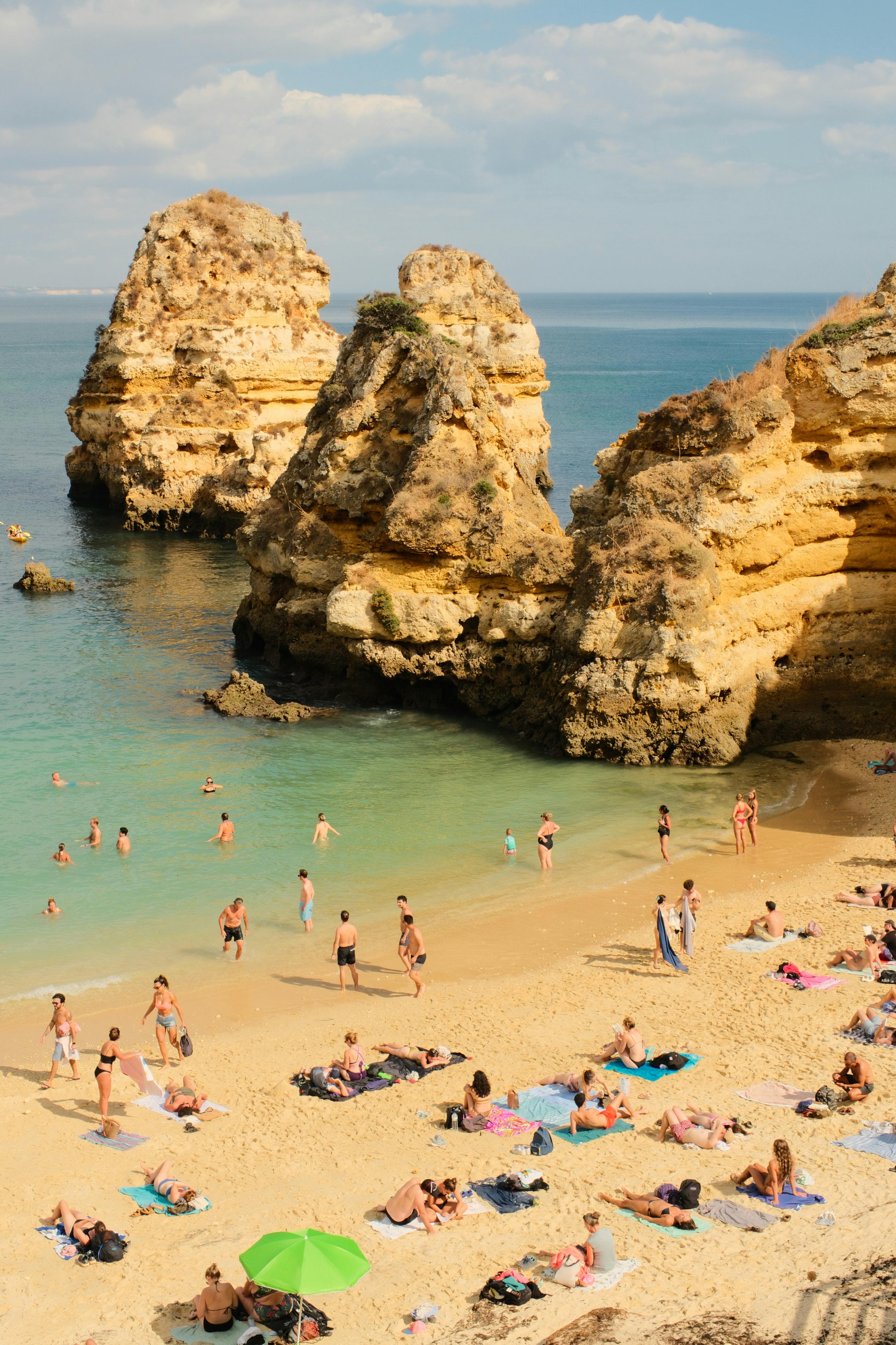 Golden rocky sea cliffs – surfboard rental in Portugal