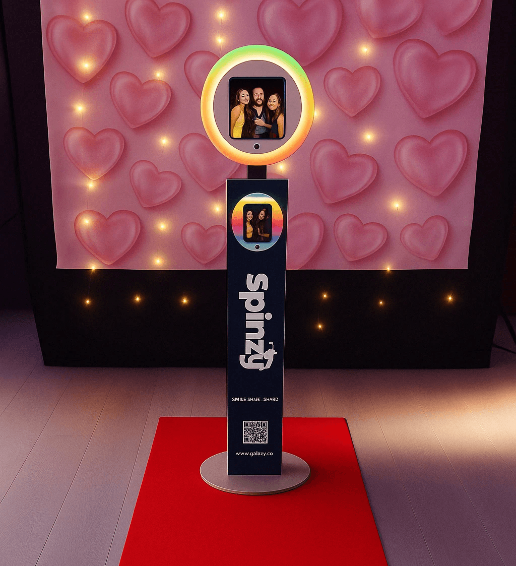 Spinzy Selfie photobooth Gold package setup with custom backdrop