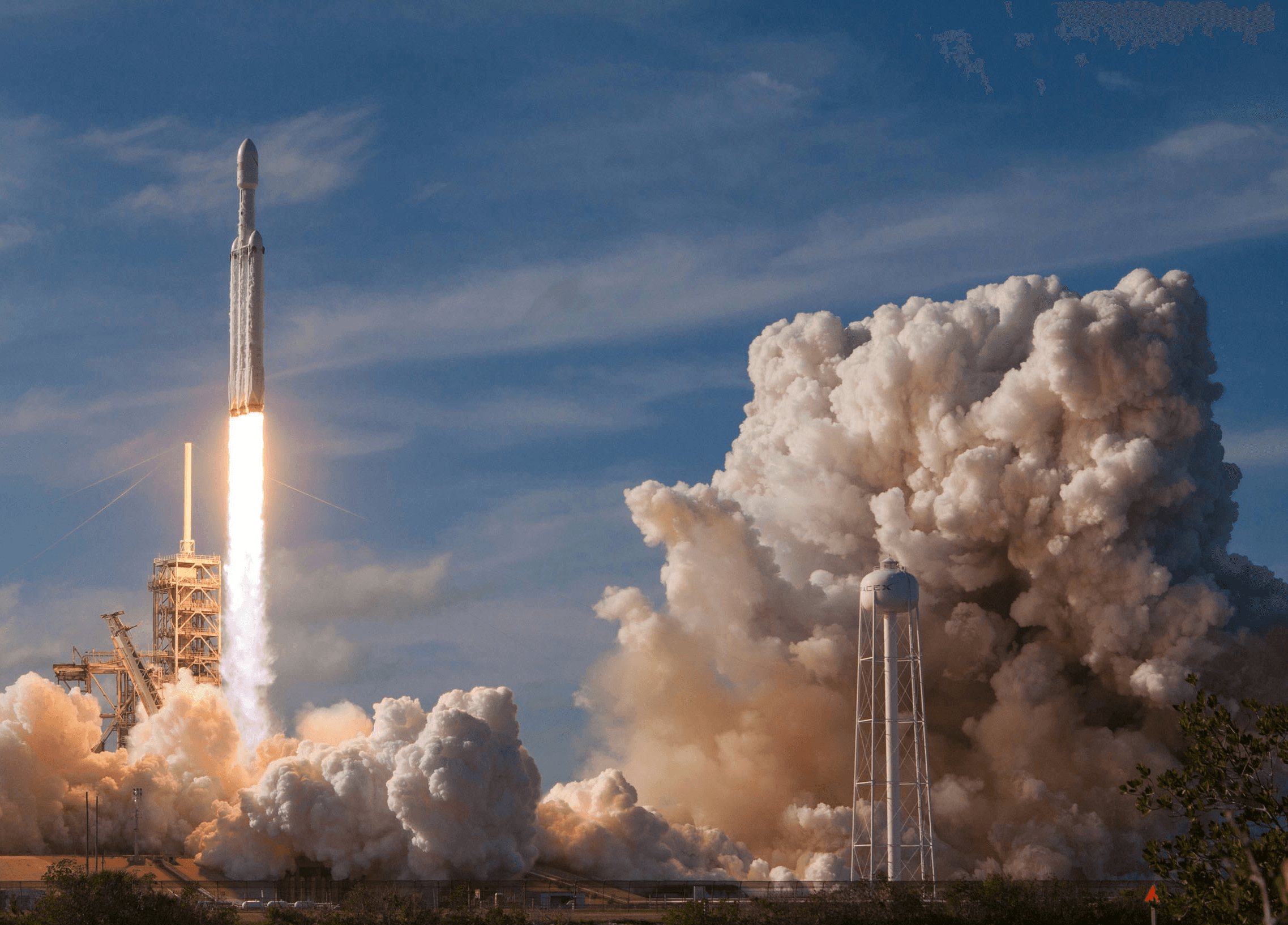 gray spacecraft taking off during daytime