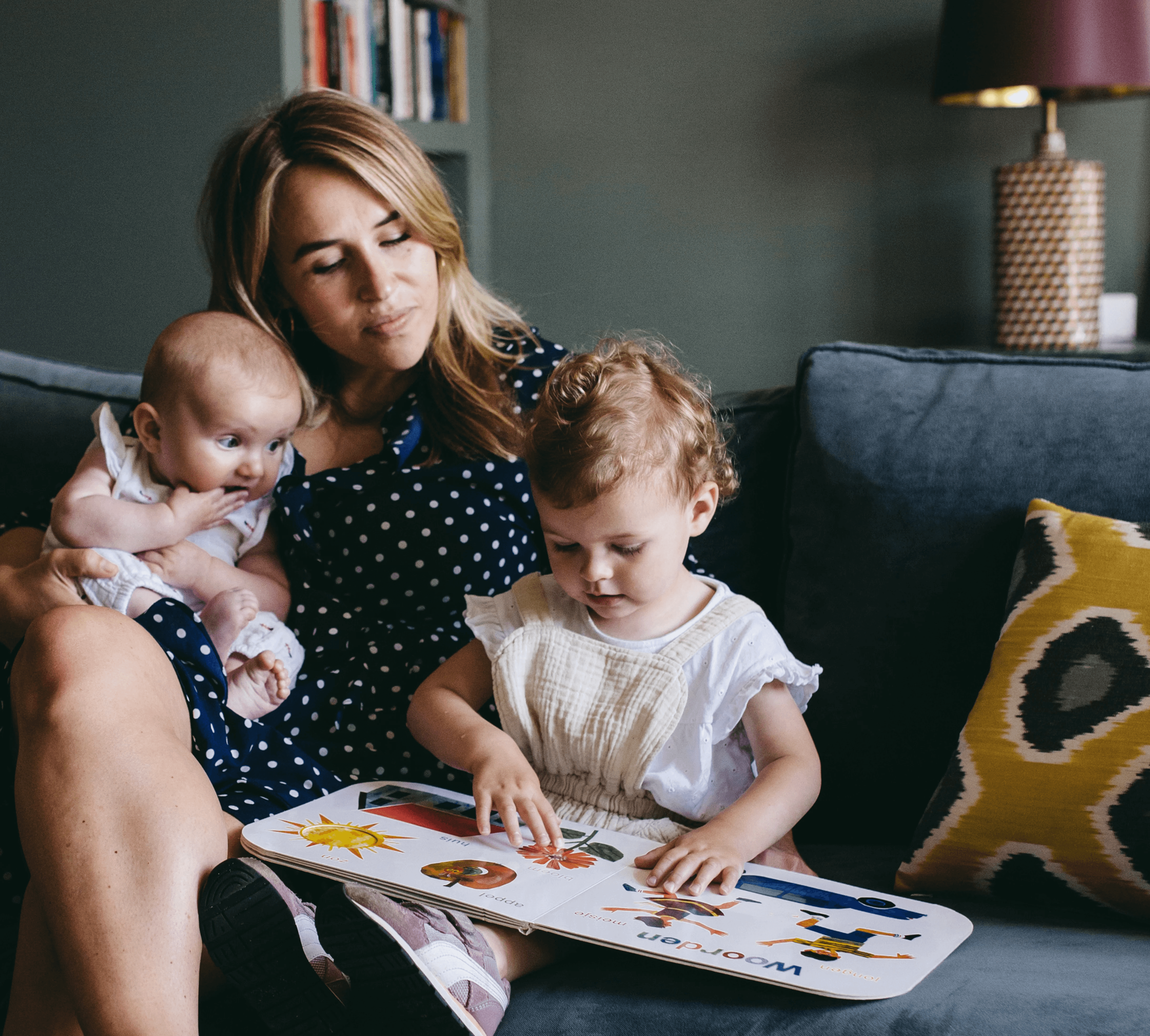 Babysitter reads stories to children
