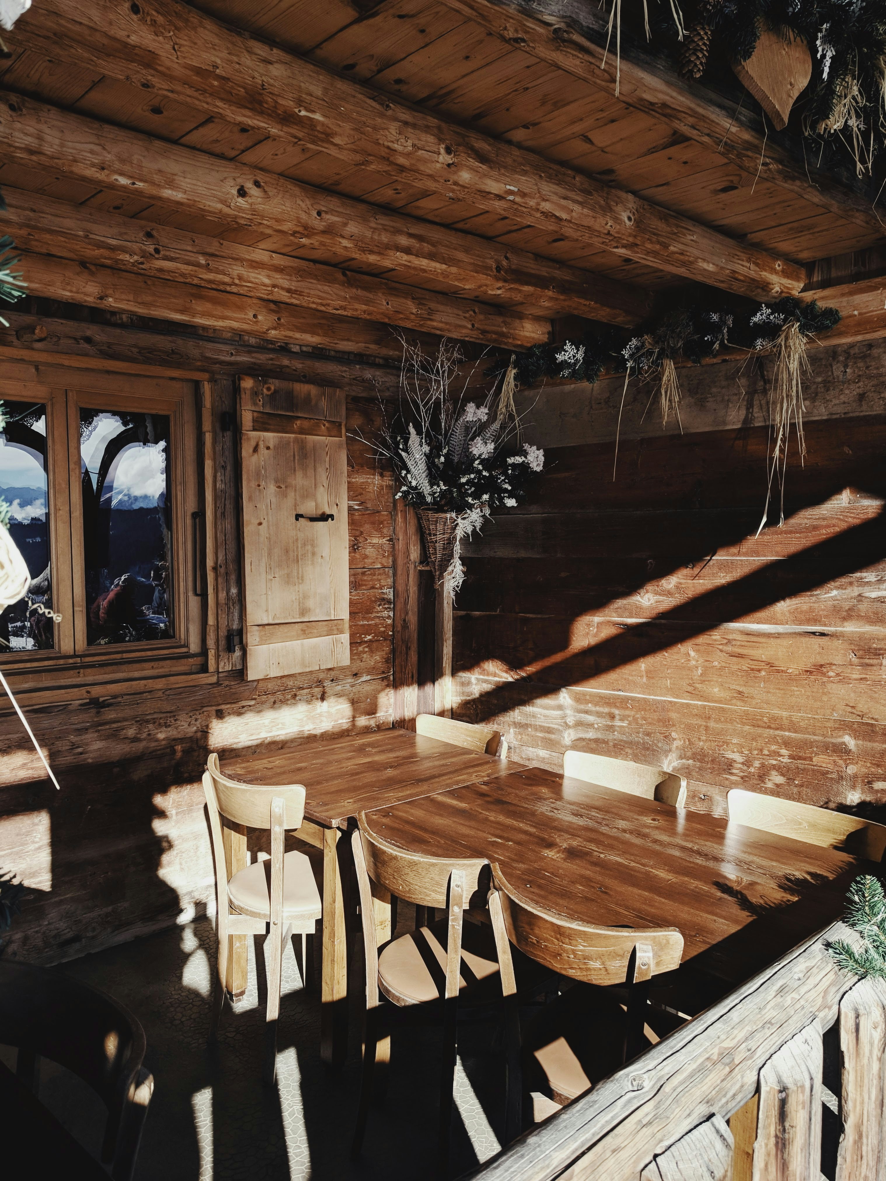 several chairs beside wooden table