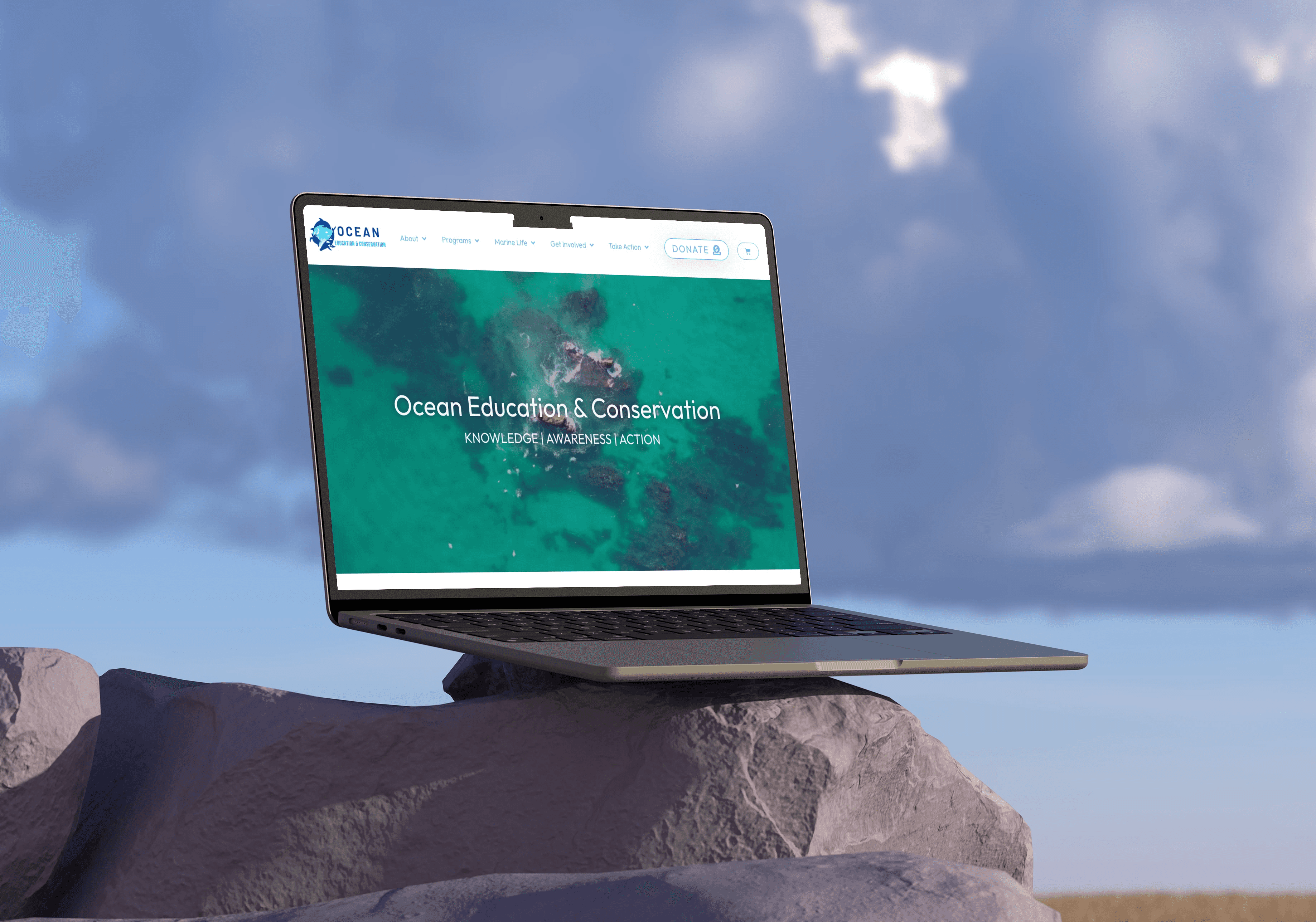 Mockup of a website with a laptop balanced on a rock