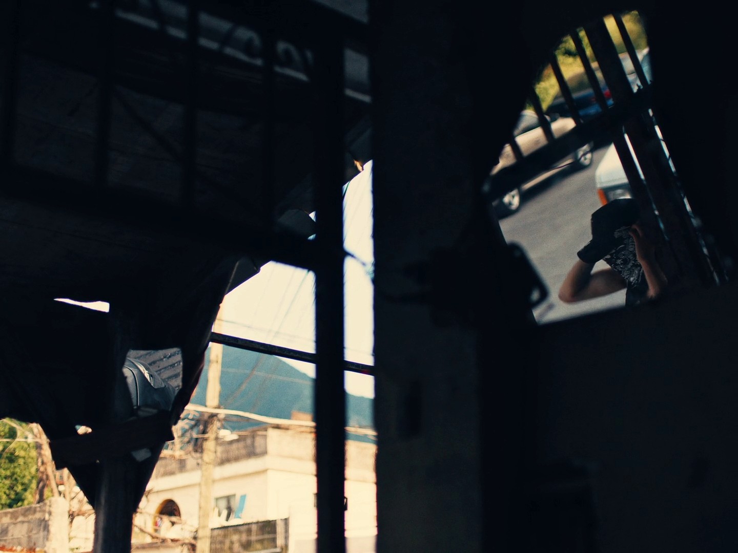 High-contrast cinematography by Mike Bautista for "Perro Lobo," where shadows contain information and the lighting reveals the soul of the story rather than just illuminating the set.