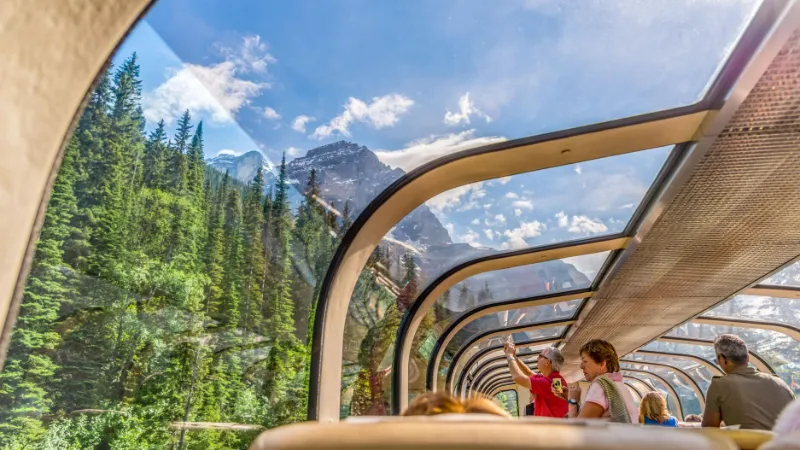 Rocky Mountaineer train in a mountain landscape