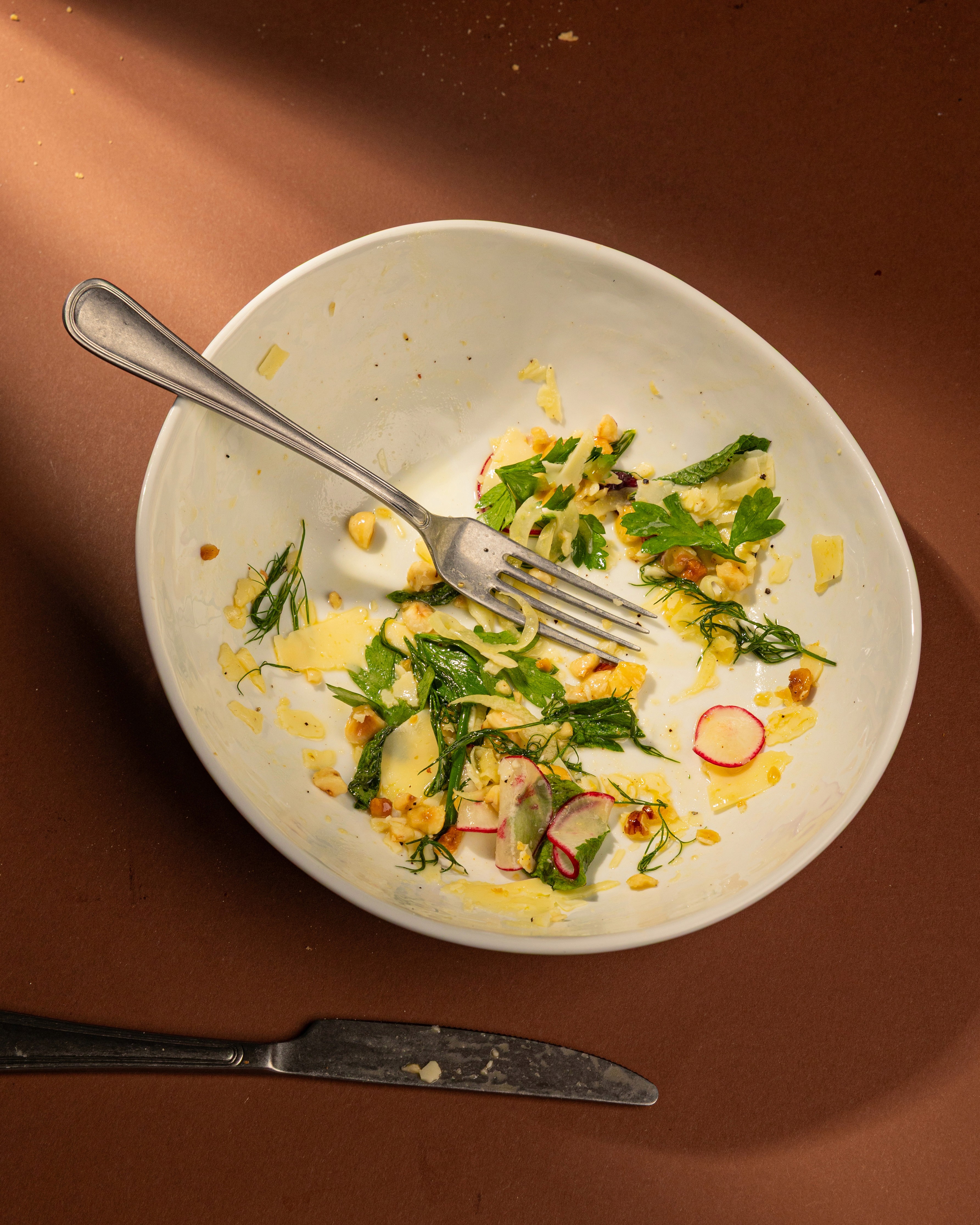 Half eaten plate of Mediterrenean dish at Boca Restaurant