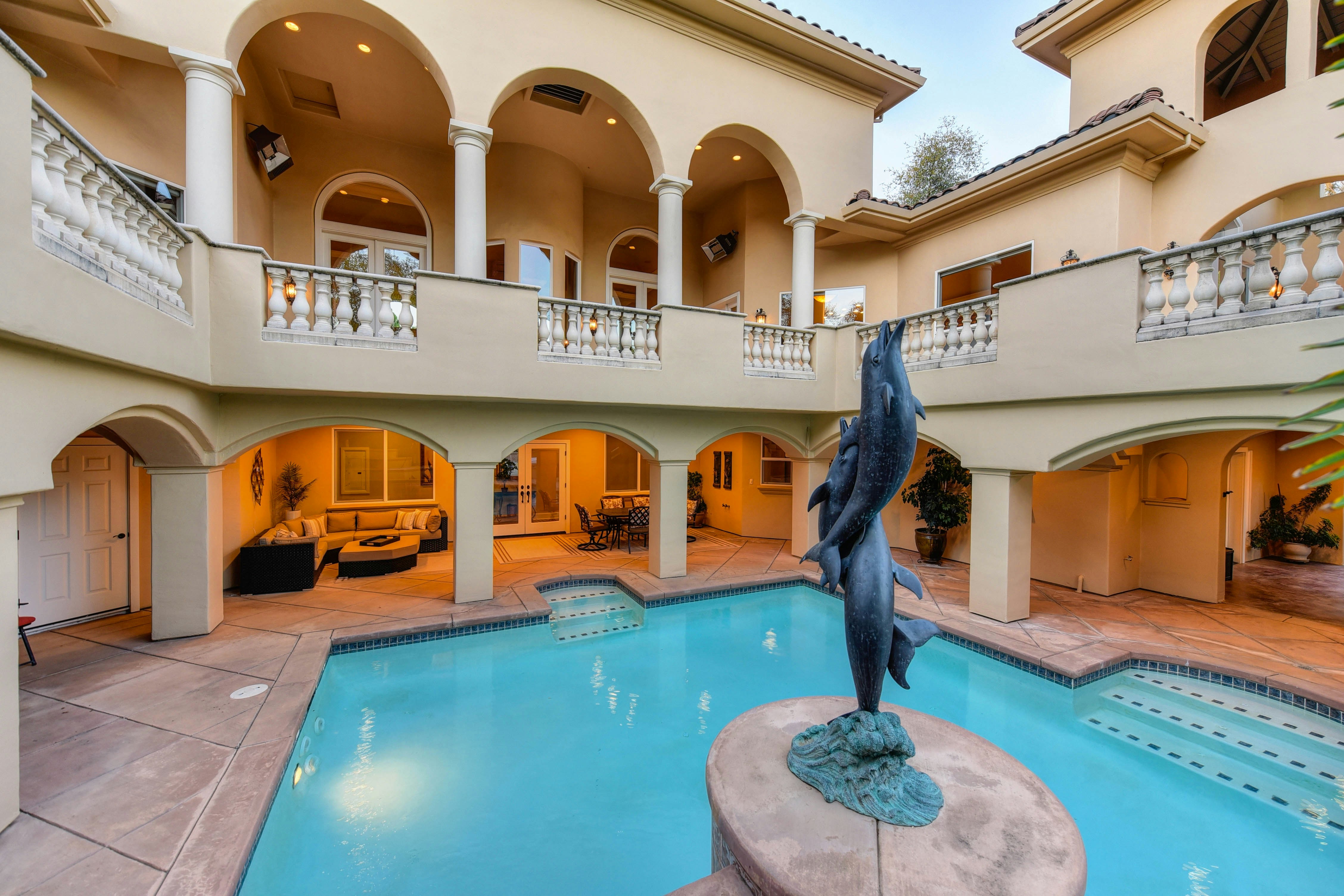 a statue in a pool