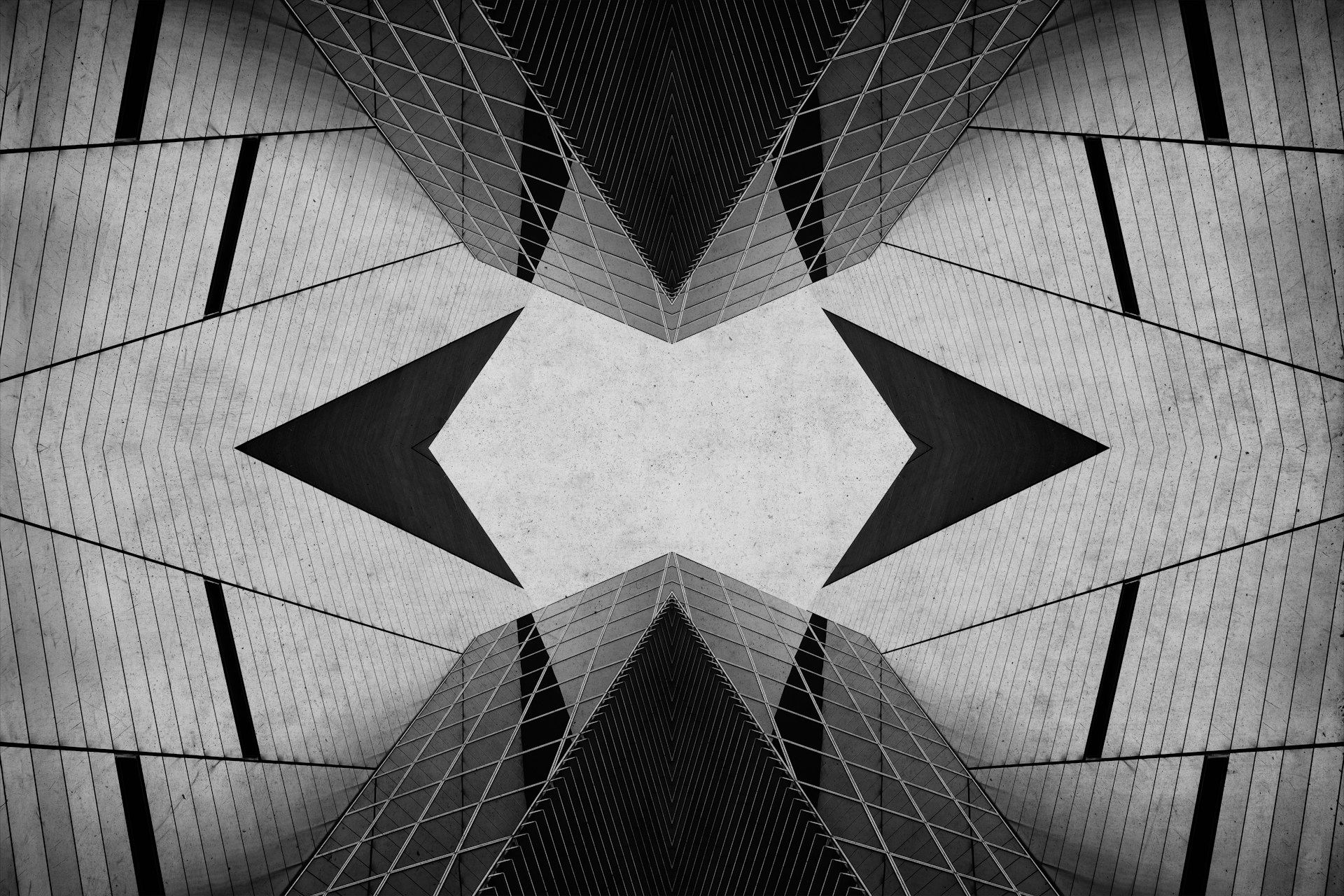 A high-contrast, black and white photograph of a symmetrical architectural ceiling pattern. The repeating structural lines visualize the concept of translating physical spatial design and wayfinding into digital UX architecture.