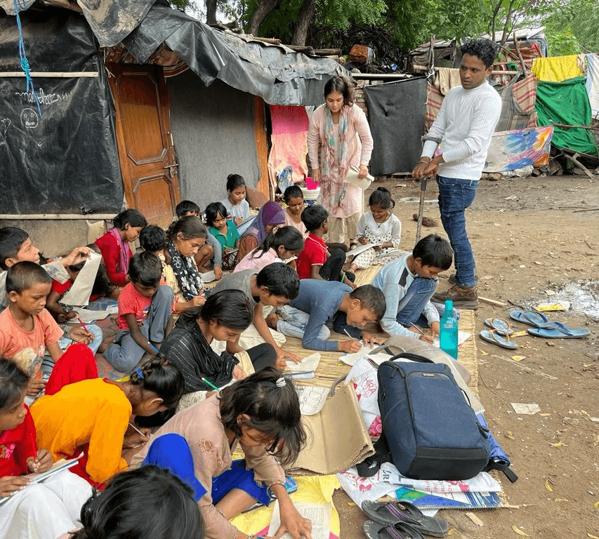 Rations and art classes in a Delhi slum.