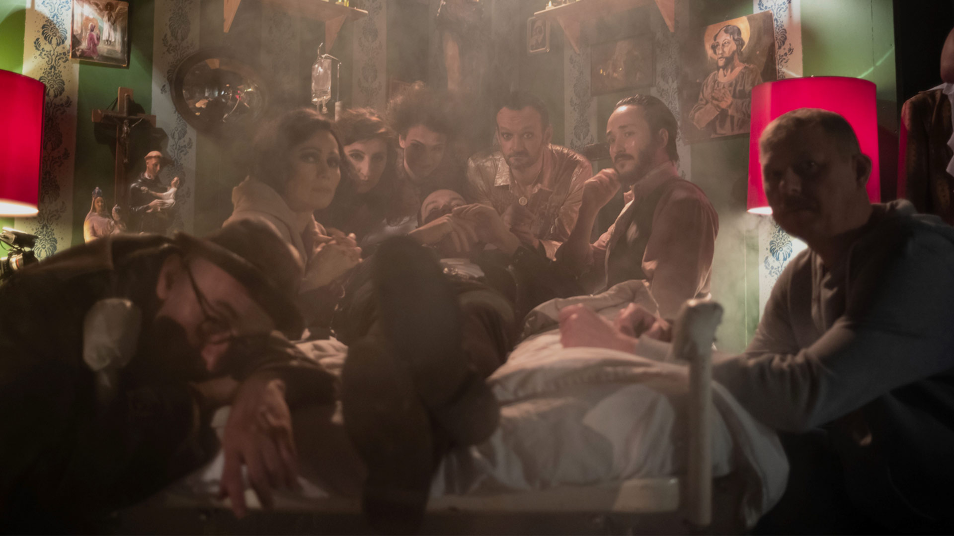 An orange cube-shaped side table is shown.