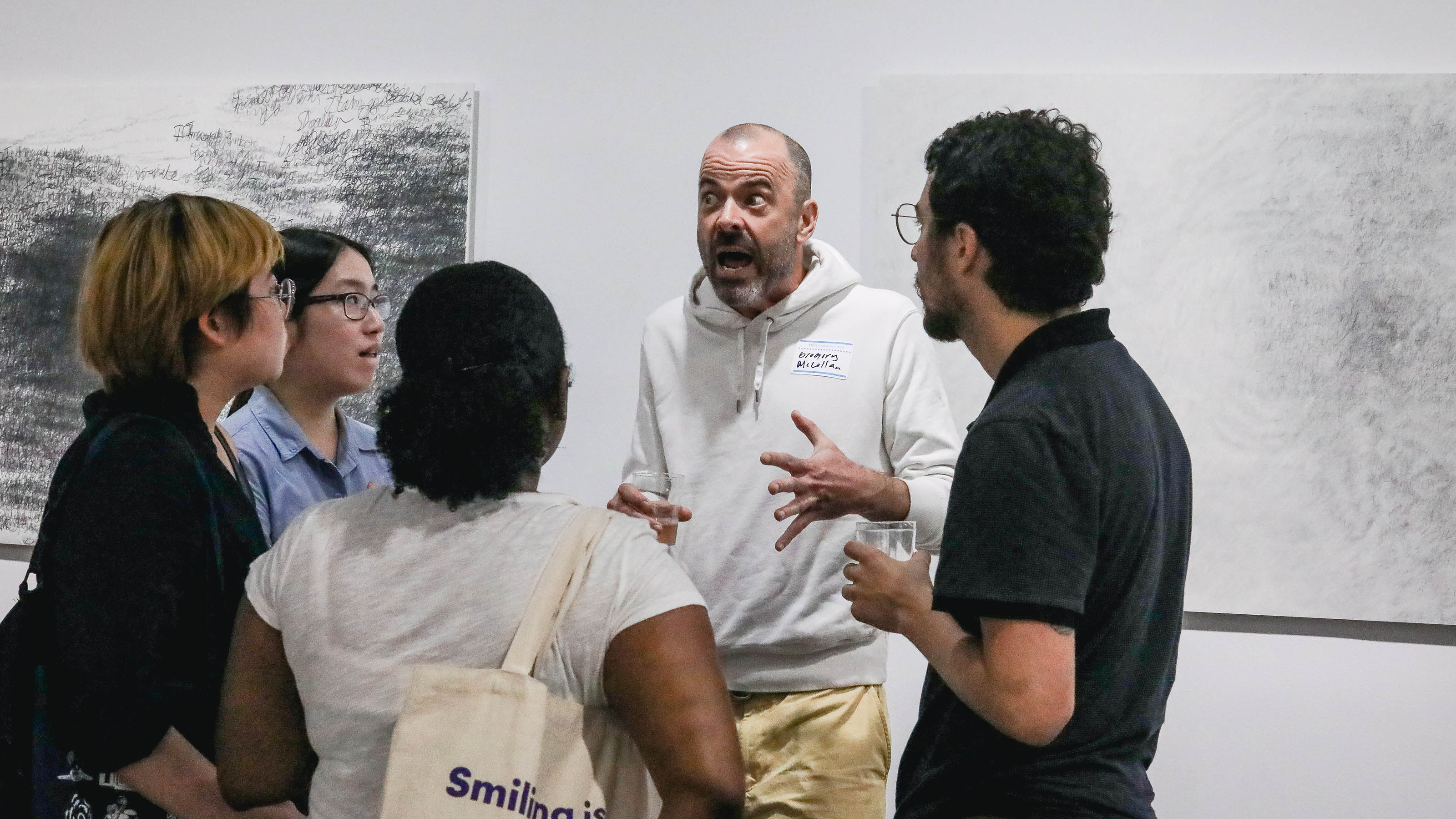 Students and Faculty discussing work
