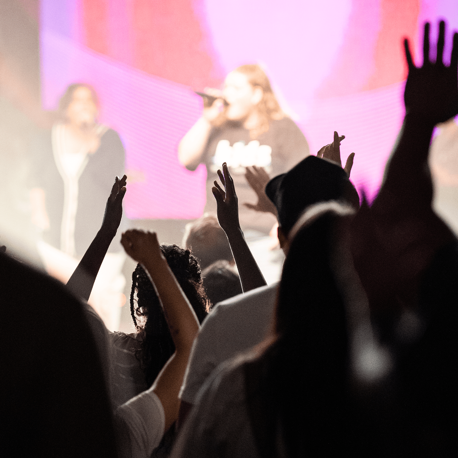 Hands lifted during a worship service.