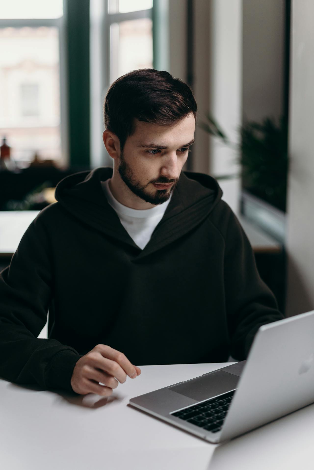 man working on laptop