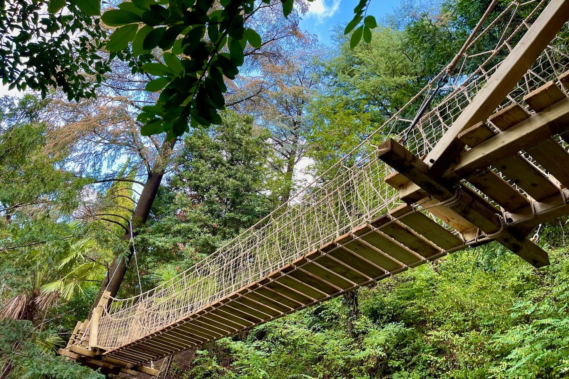 Streetside billboard with flyposters of the Batch.Works brand and illustrations