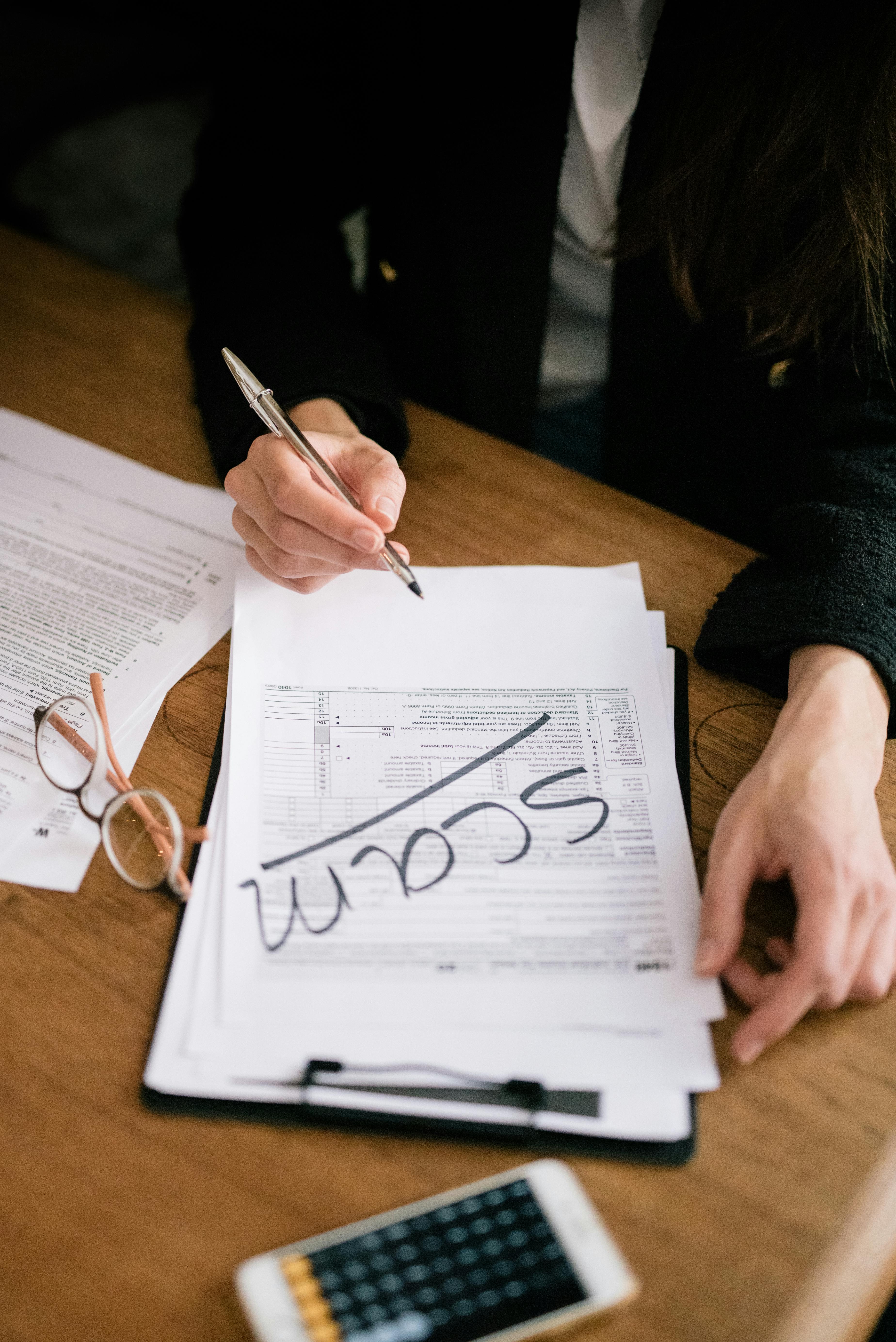 A picture of Person reviewing documents.