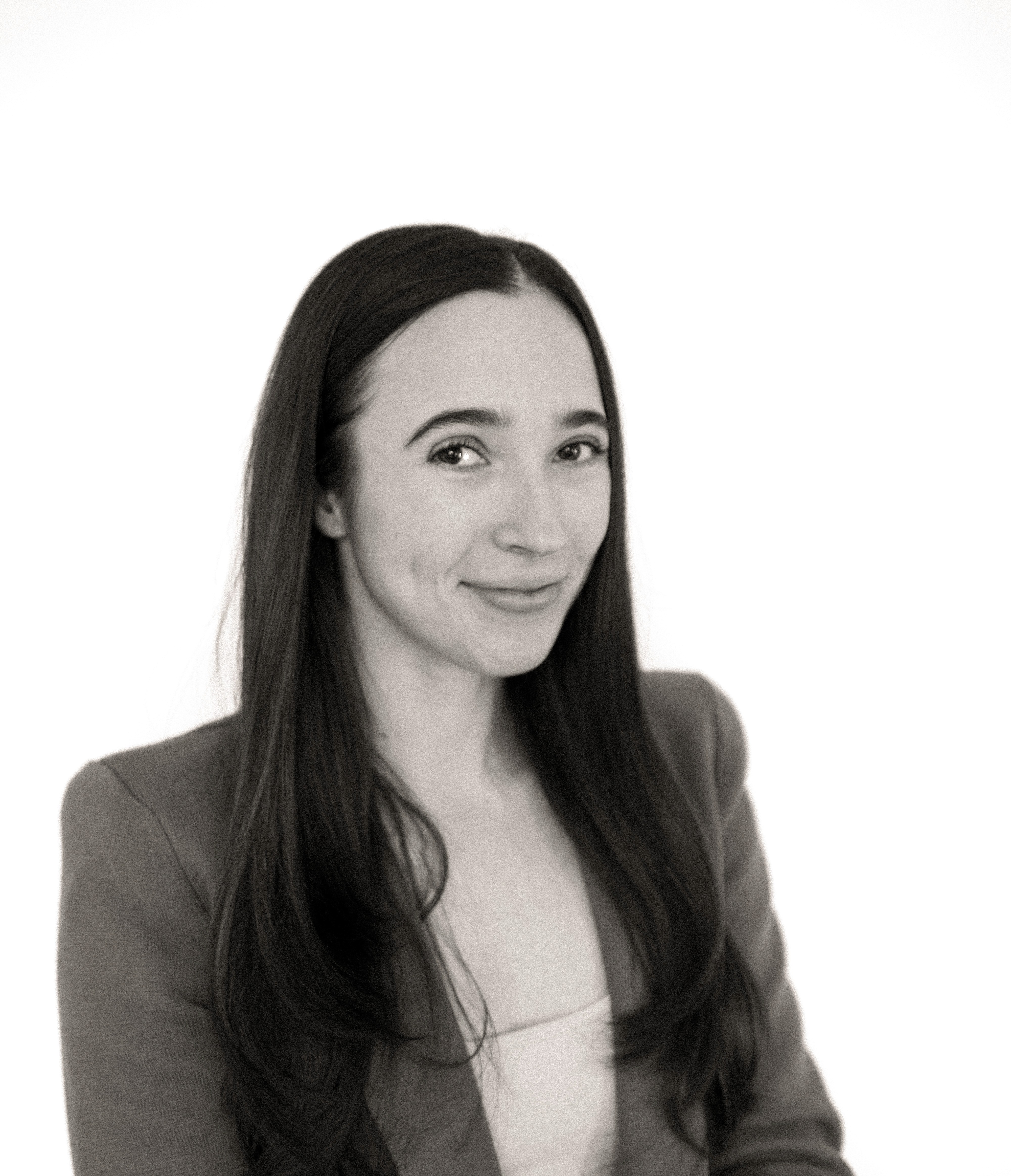 a blurry photo of a person standing in front of a wall