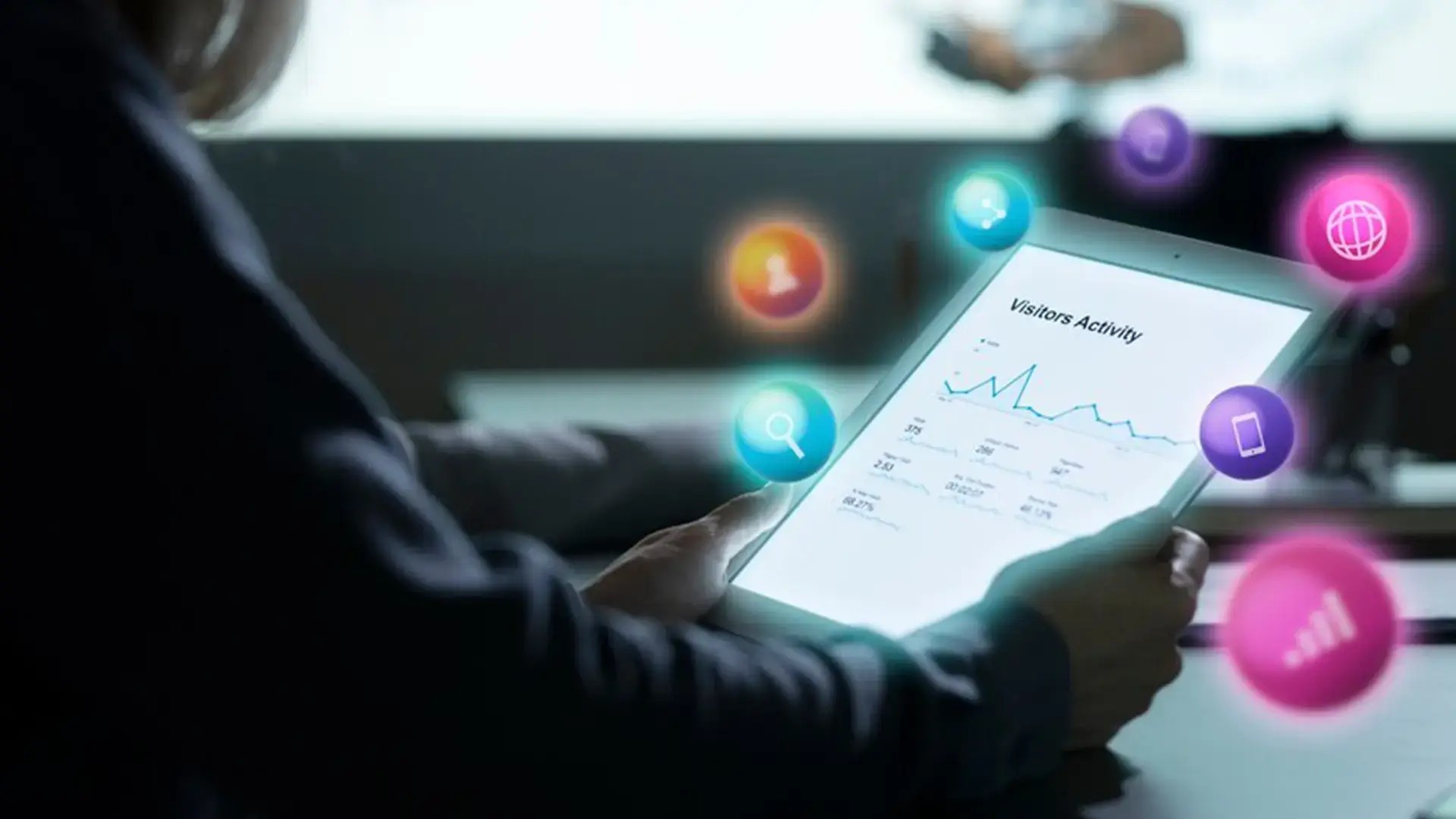 A person holding a tablet showing a graph labelled “Market Trends”. 7 pop-up circles surround the tablet, symbolising digital marketing tools and online connectivity through the graph’s digital analytics.