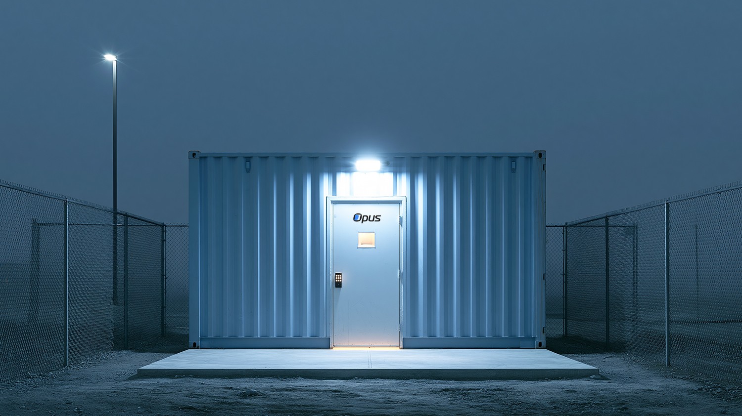 A modular shipping container featuring a secure front door, security light and digital entry touch pad.