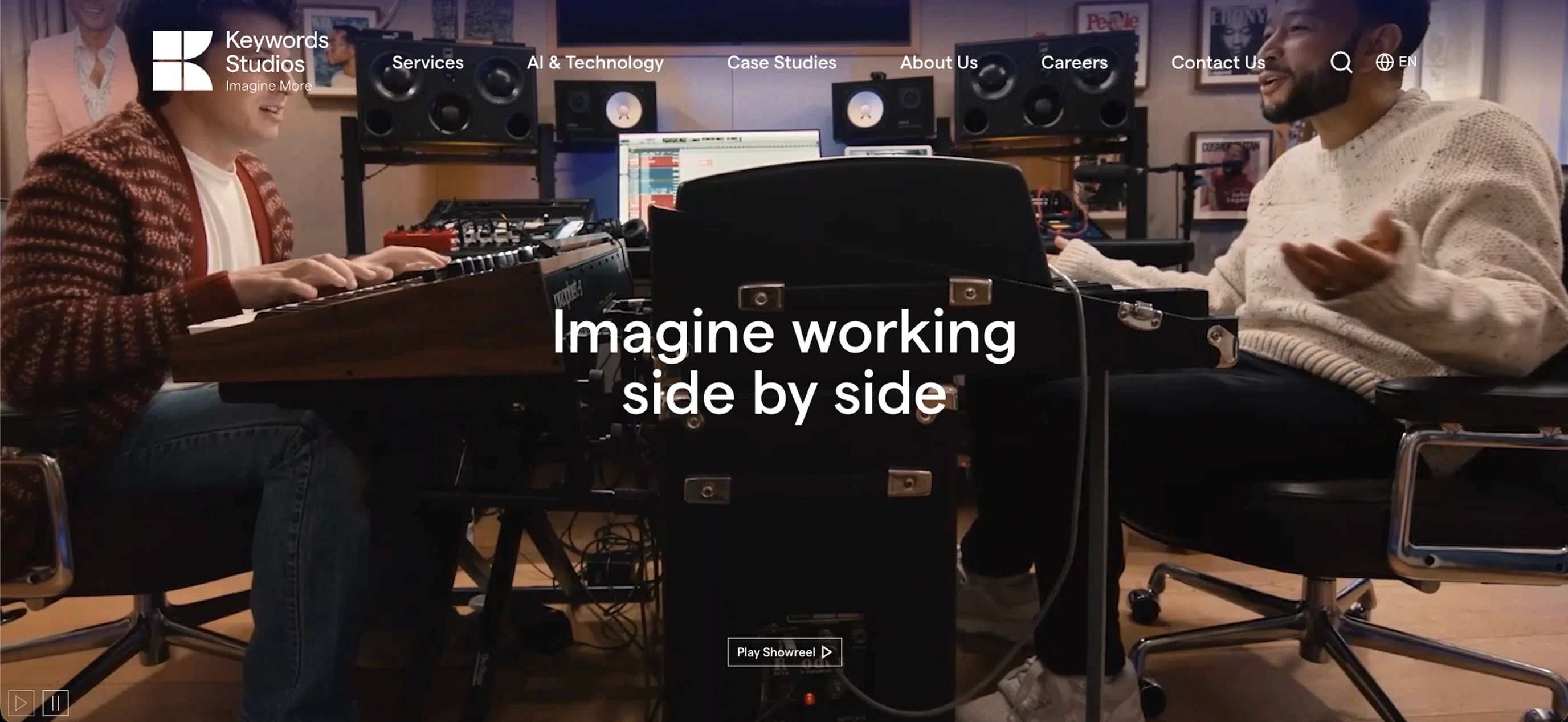 Keywords Studios homepage showing creative team collaboration in a recording studio environment
