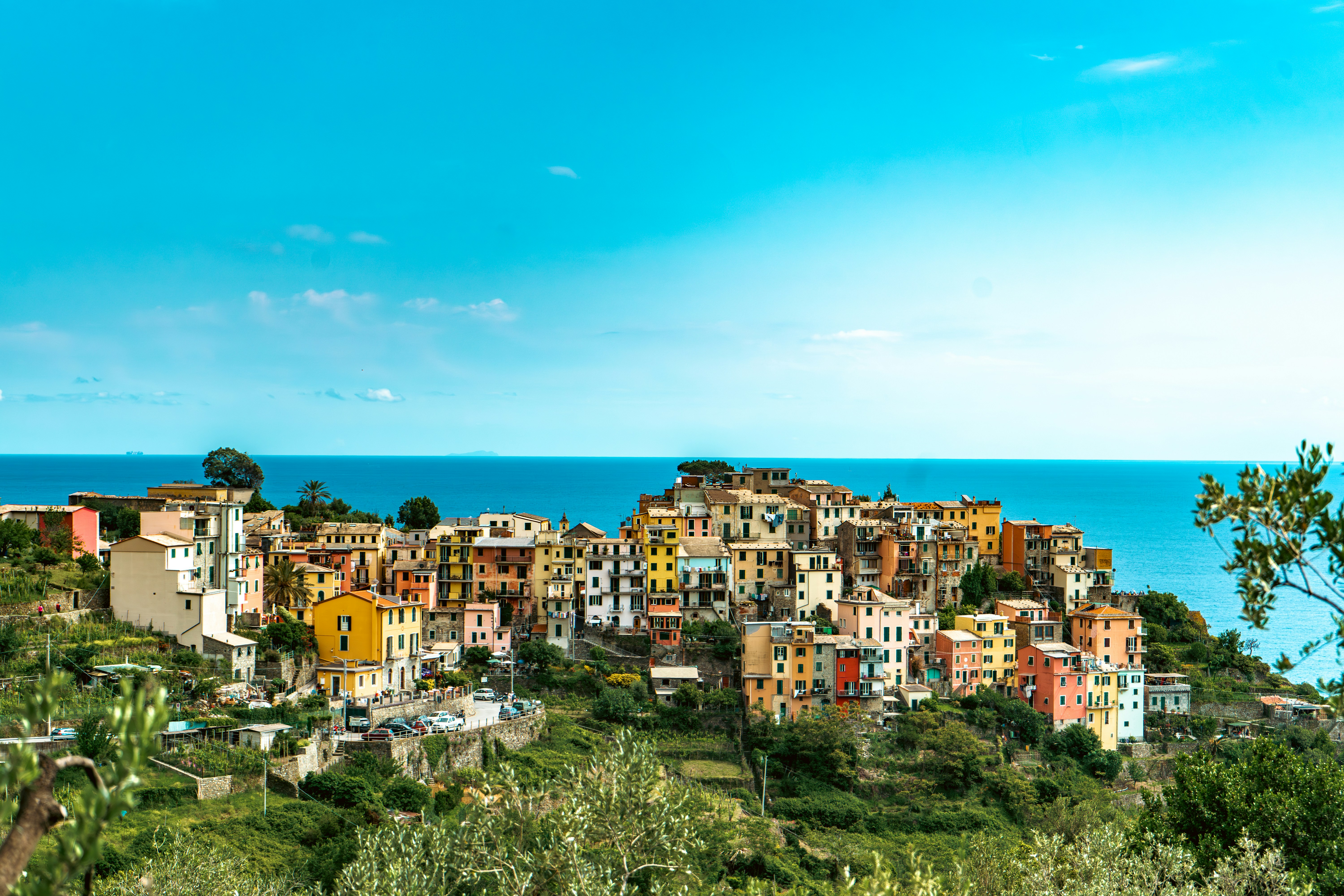 A village on a hill overlooking the ocean