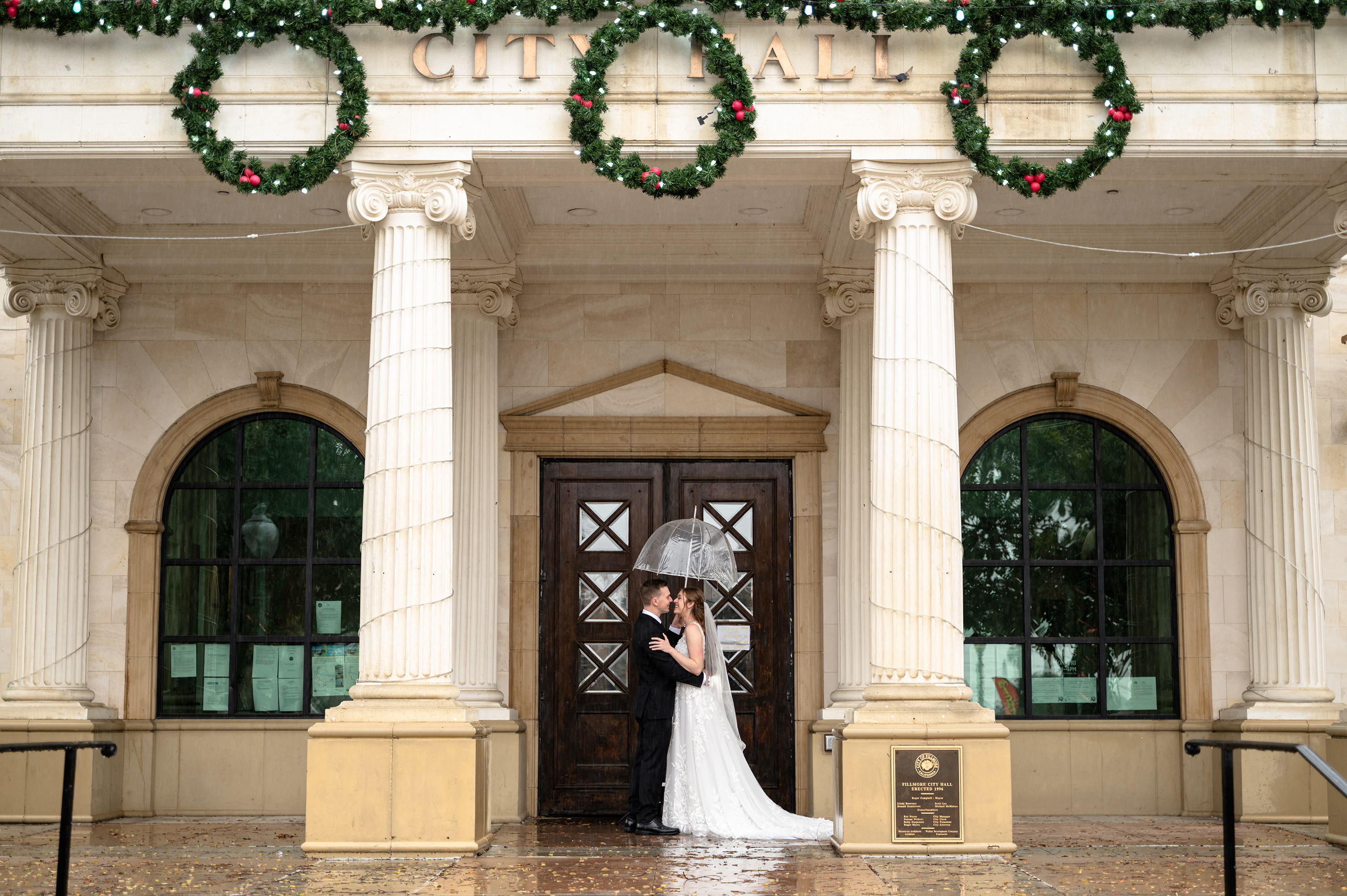 Flat lay wedding details with bouquet, rings, and sparkling bridal heels