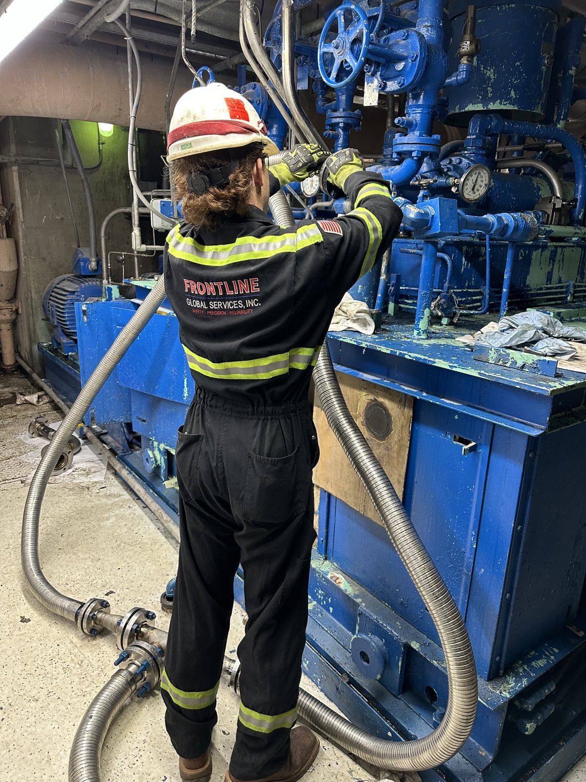 frontline employee setting up an EHC system flush