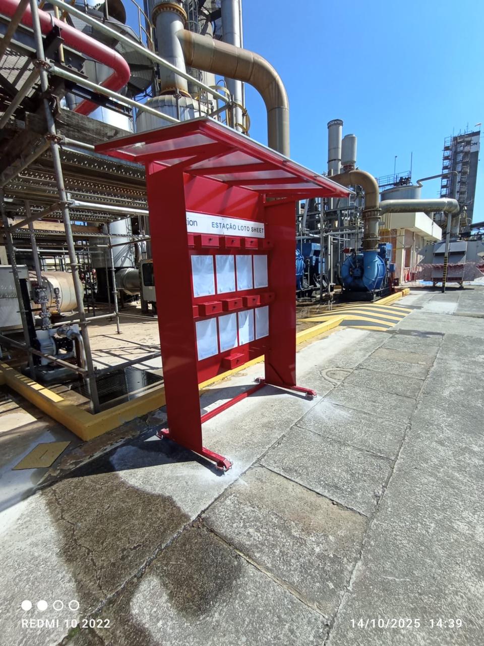 man wearing gray polo shirt beside dry-erase board