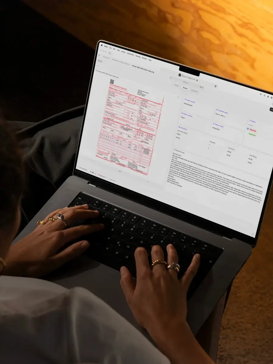 Laptop displaying an insurance claim form