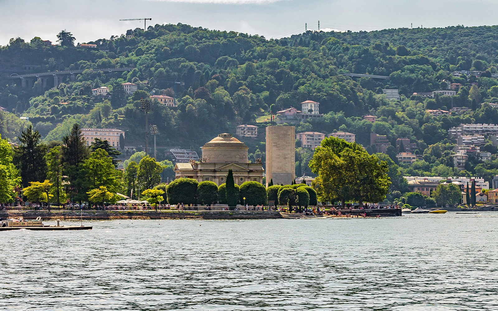 Lake Como public tour with view of Tempio Voltiano and lush hills.