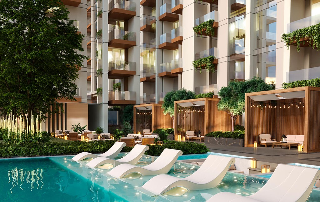 A pool surrounded by lounge chairs, with a building in the background, labeled 'Levanto by ORO24'.