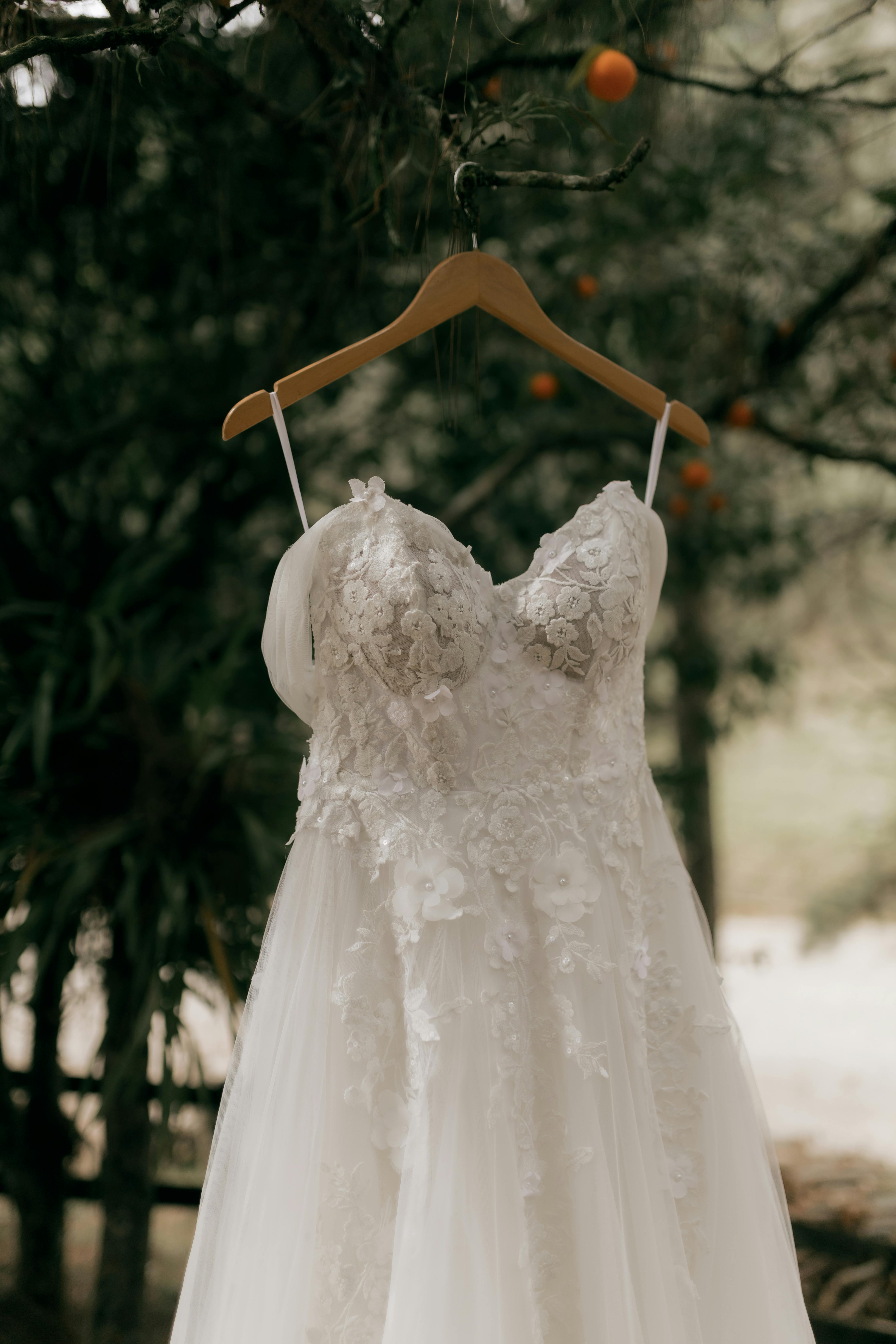 A bride and groom embracing on a boat