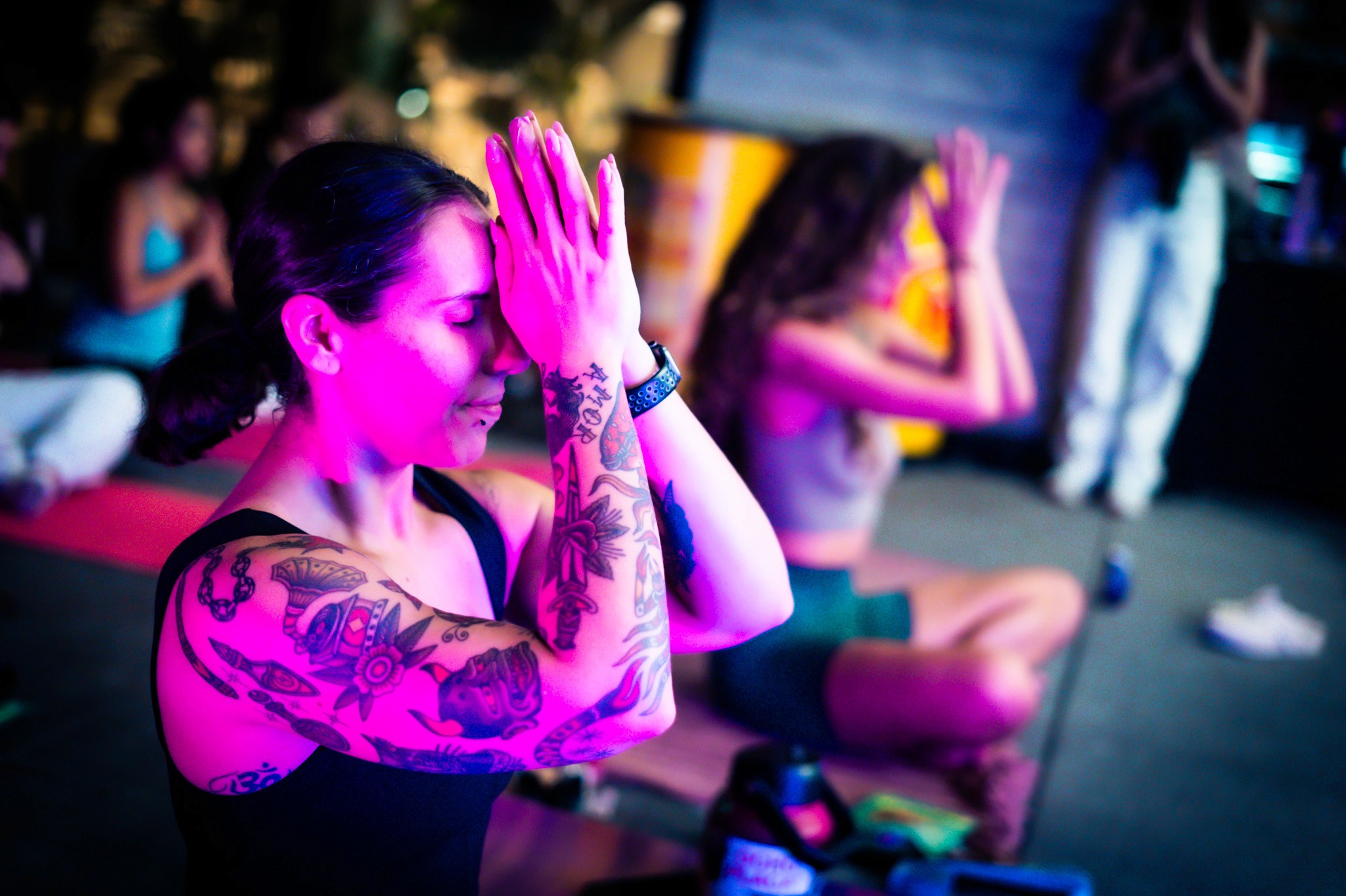 Serene woman with leaf shadows