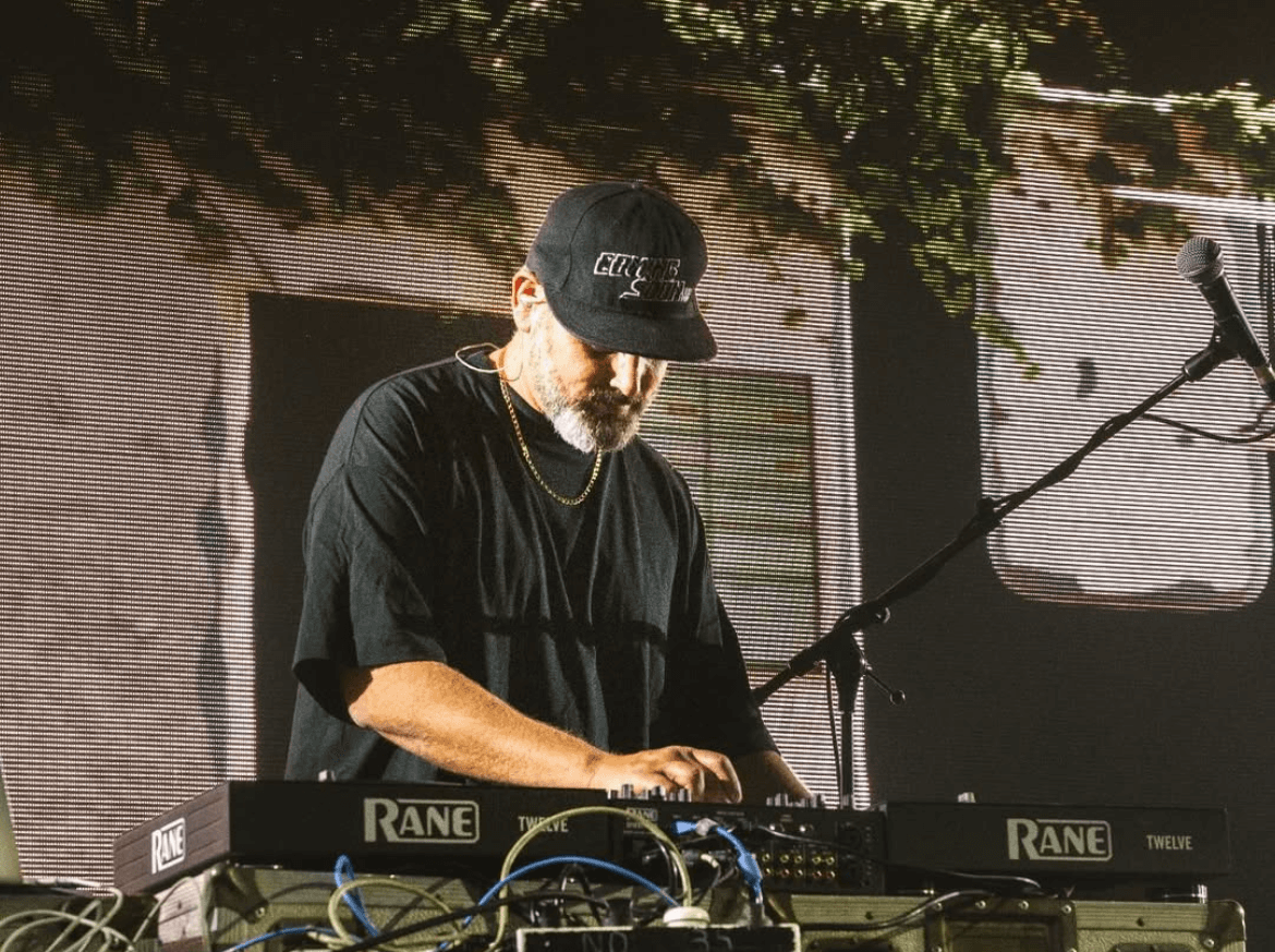 Cohen Performing Live with the visuals in the background