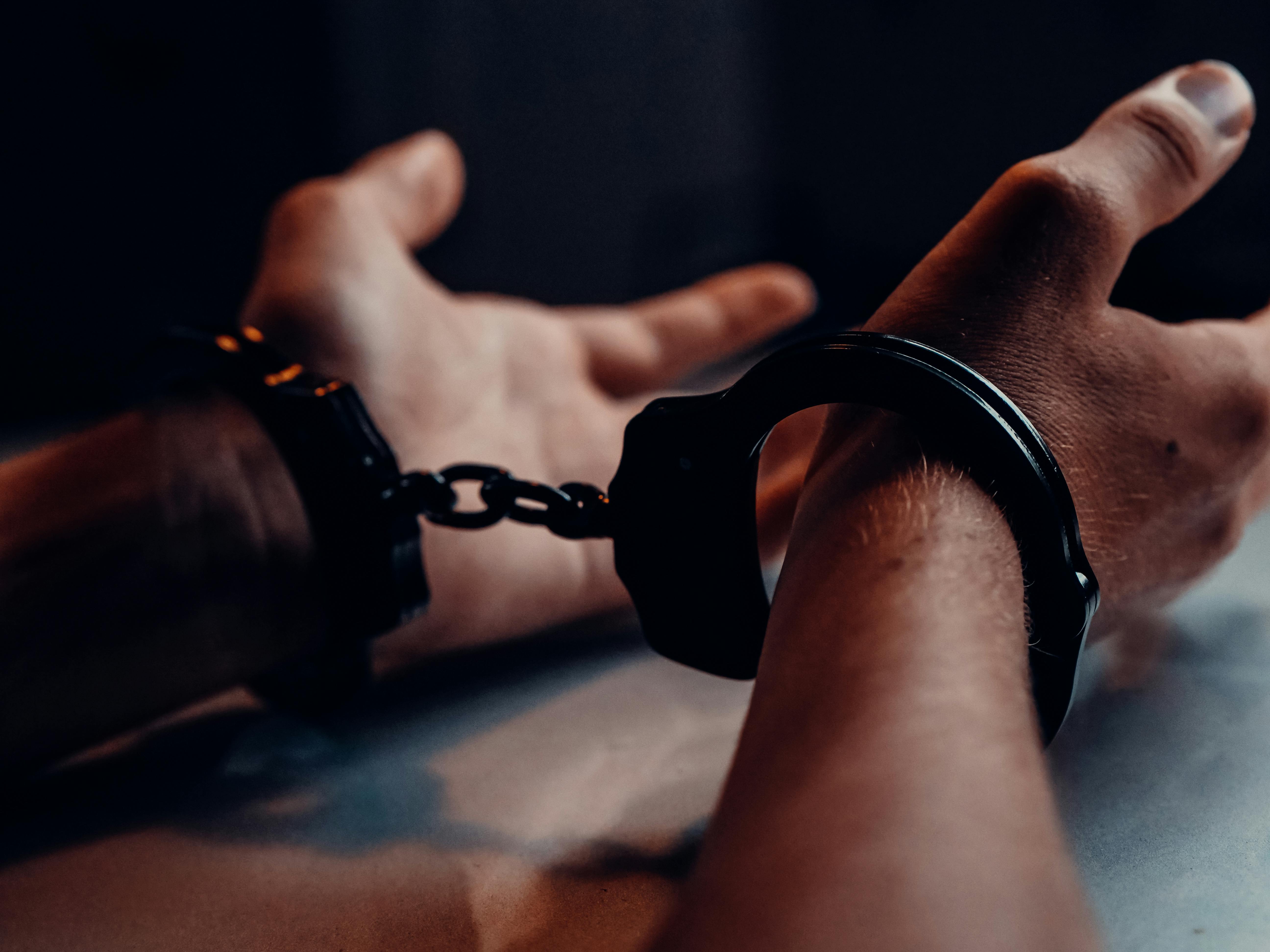 person showing handcuff