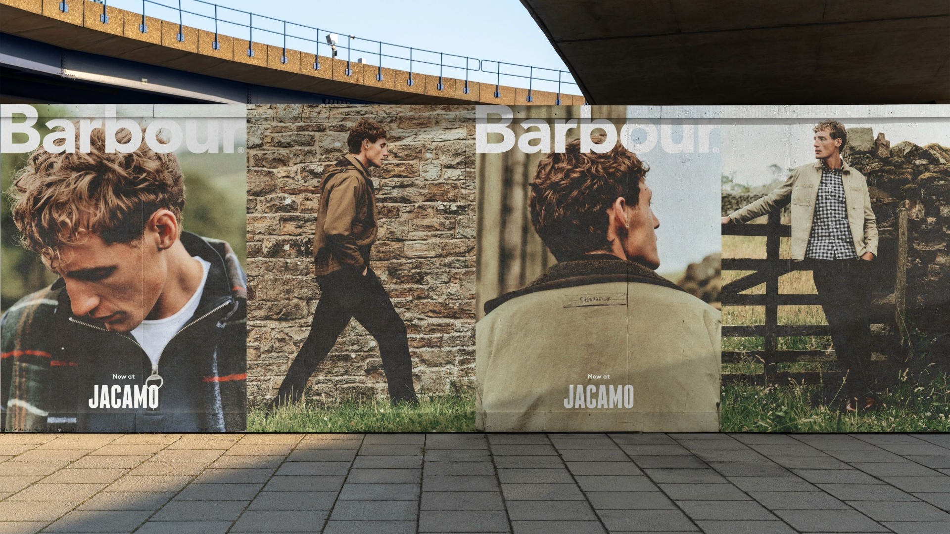 Streetside billboard with flyposters of the Batch.Works brand and illustrations