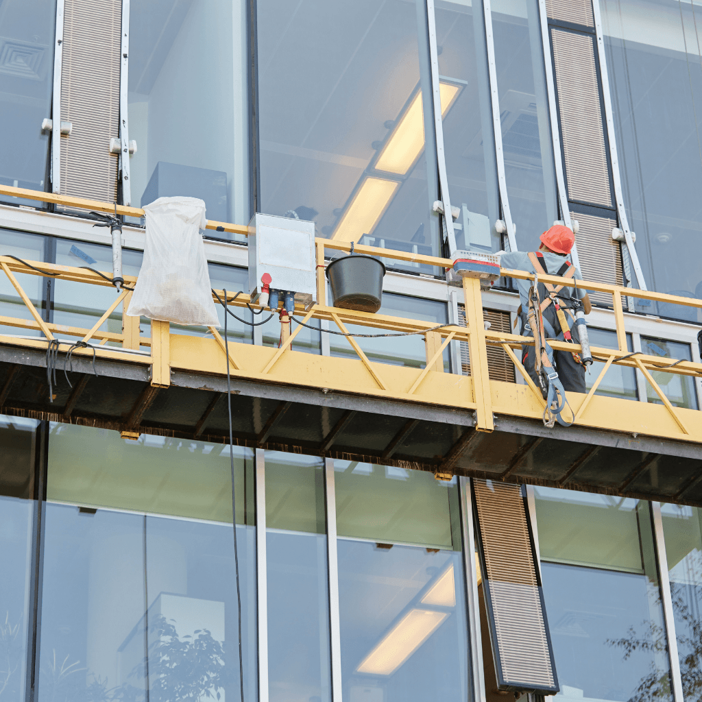 two people looking at a tablet and smiling