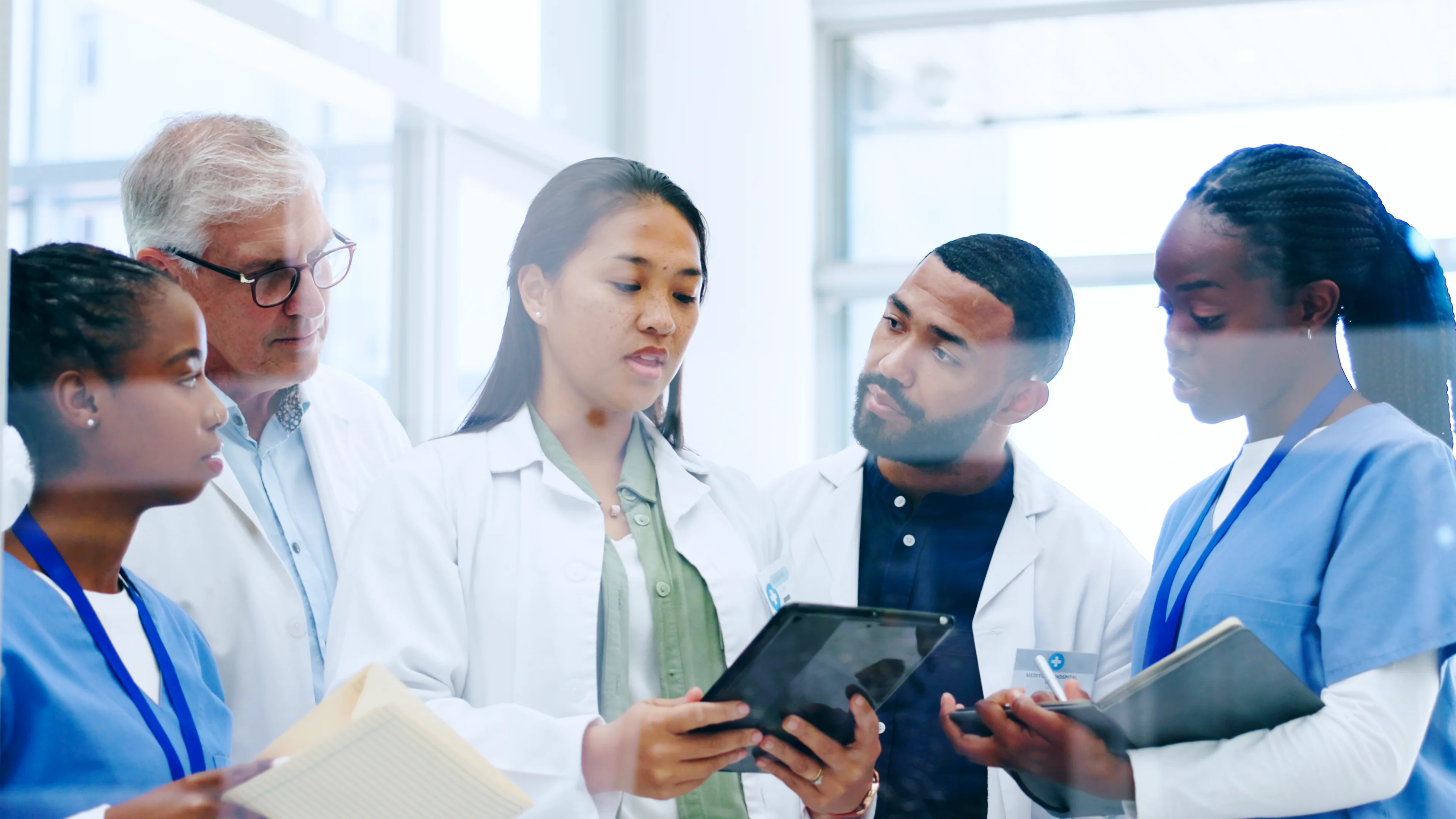 Filipino Doctor briefing medical team in the United States