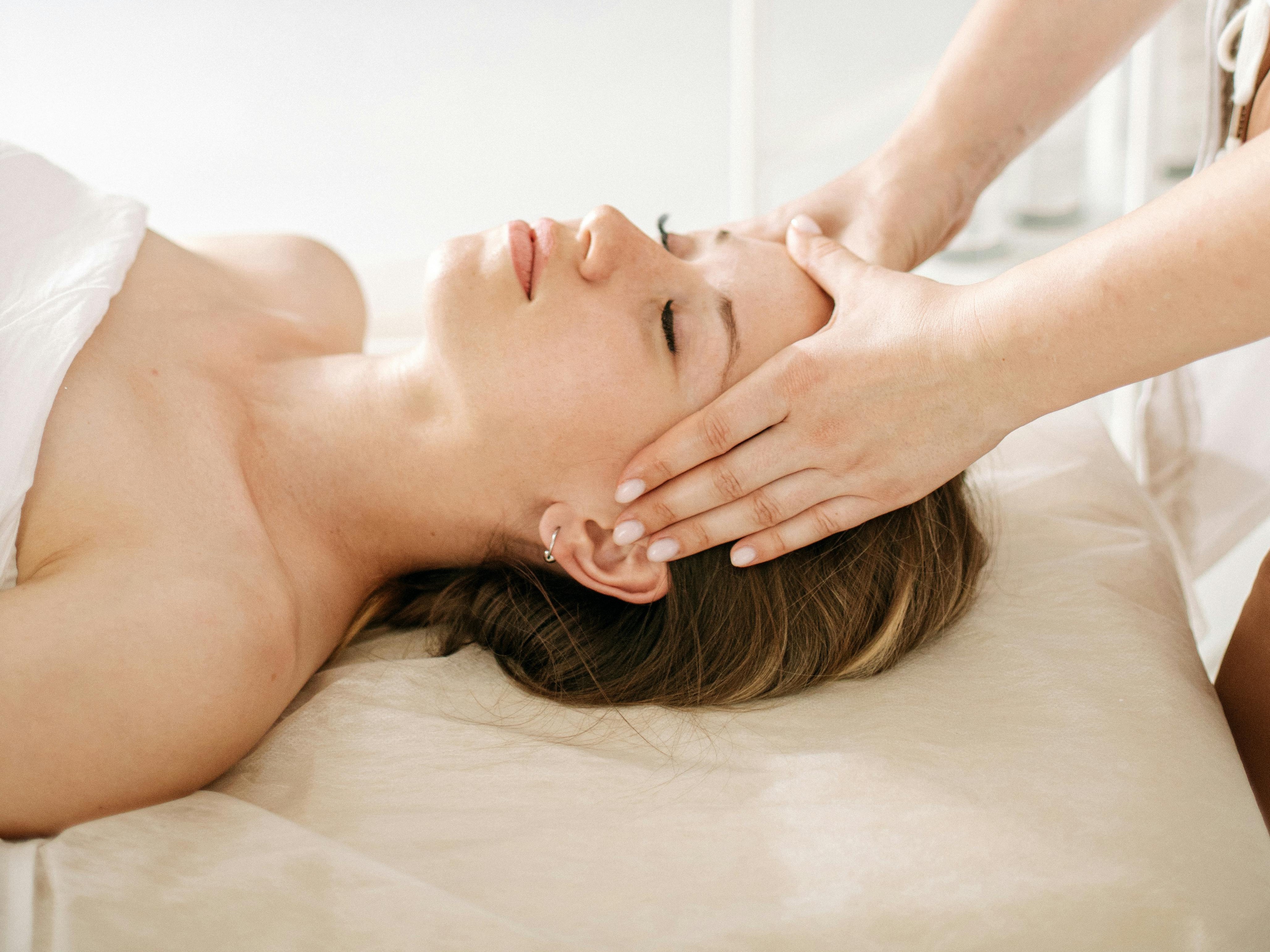 Laser hair removal treatment being performed on a client’s leg for long-term hair reduction and smoother skin.