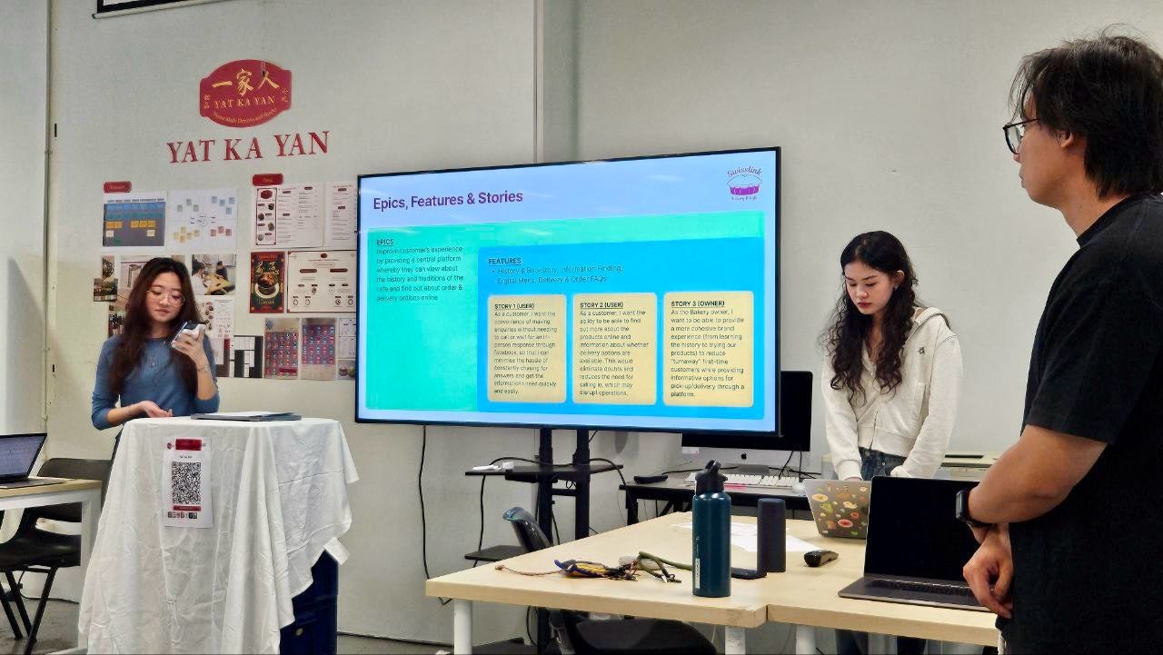 Two iphones standing on display showing application login screens