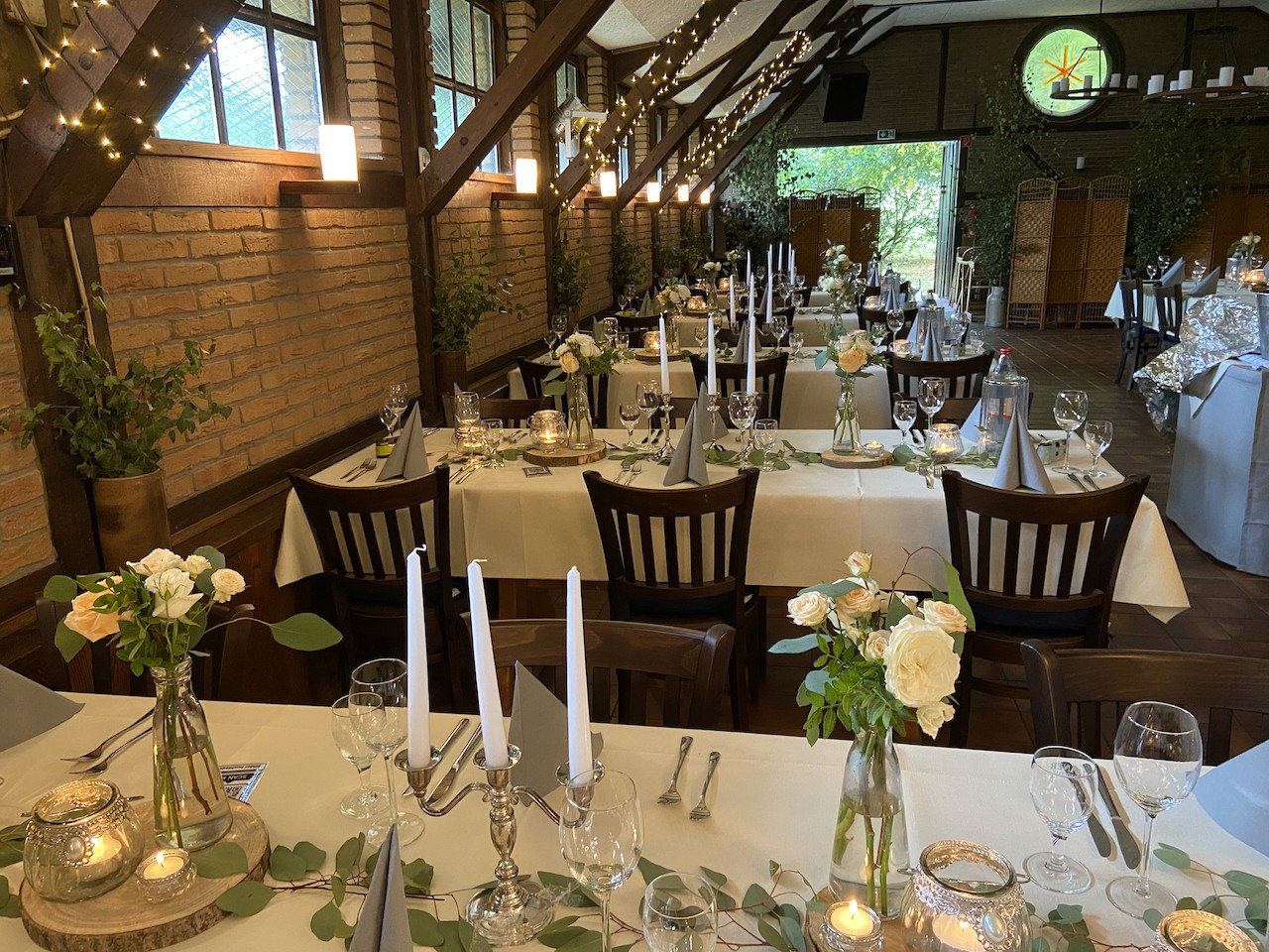man wearing gray polo shirt beside dry-erase board
