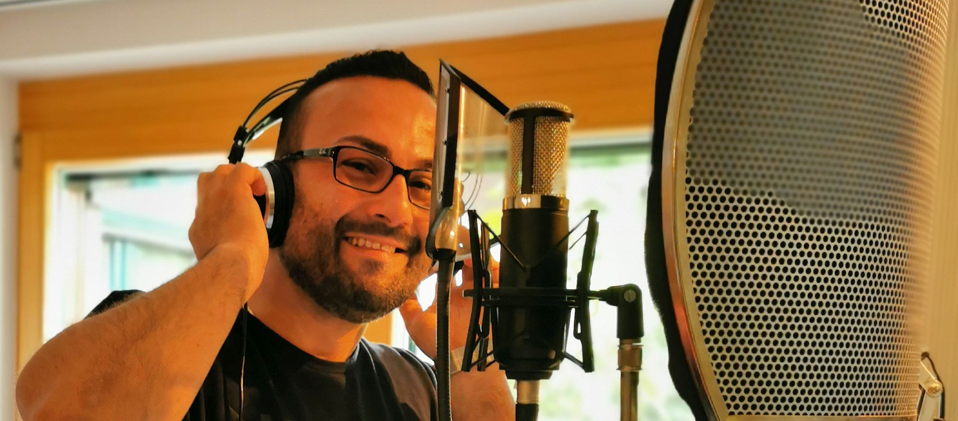 a woman wearing a black coat and a white scarf