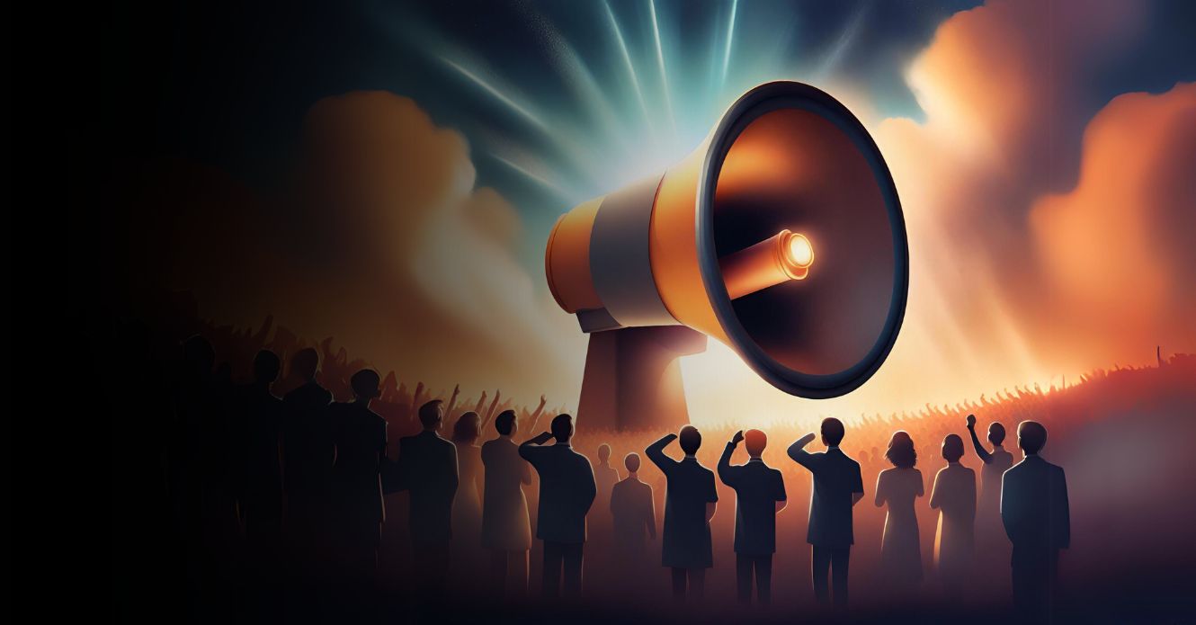 Silhouetted crowd facing giant glowing megaphone in dramatic sky