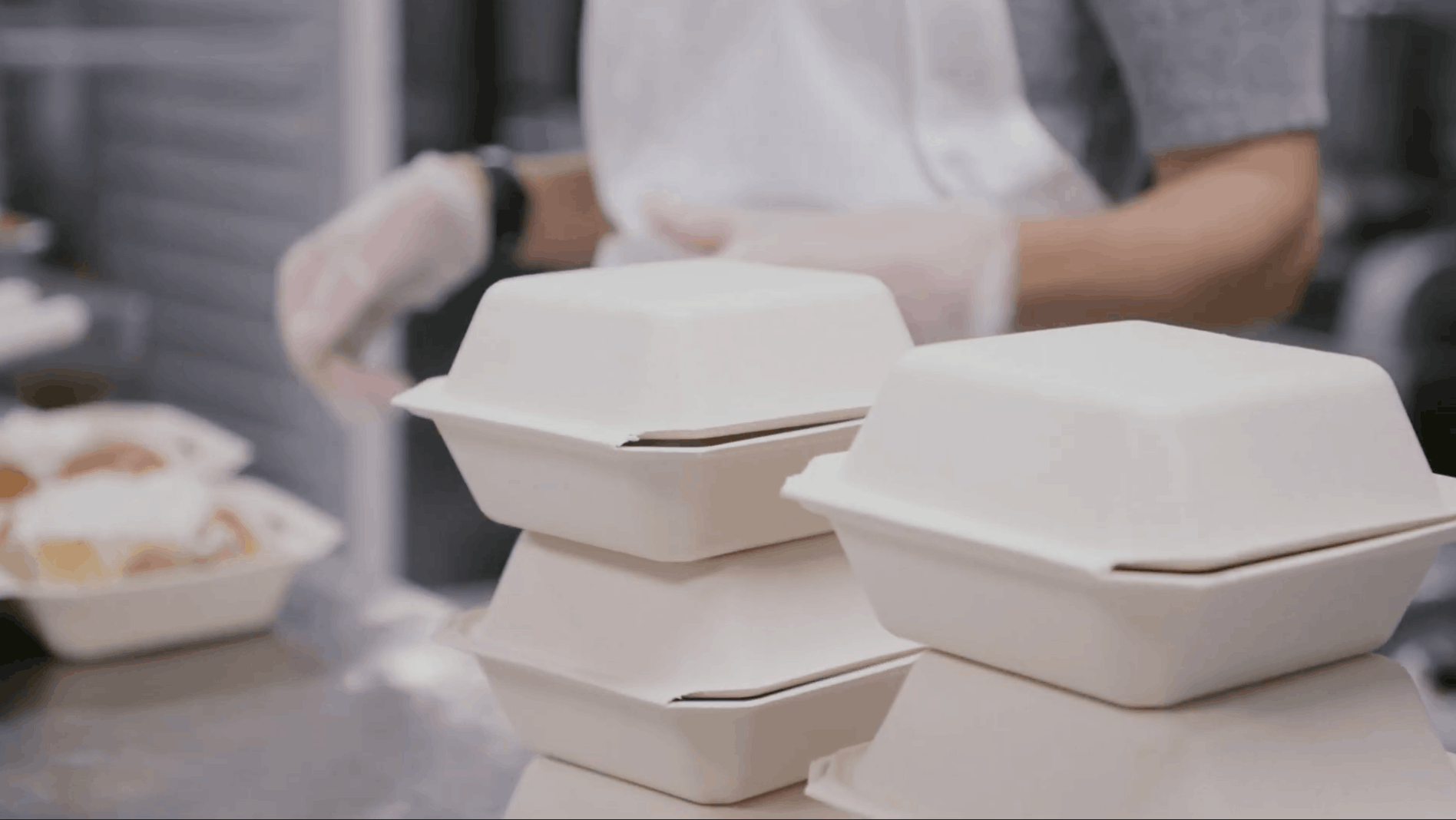 items get packed into delivery boxes in a cloudkitchen